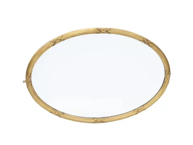 AN OVAL GILTWOOD WALL MIRROR
