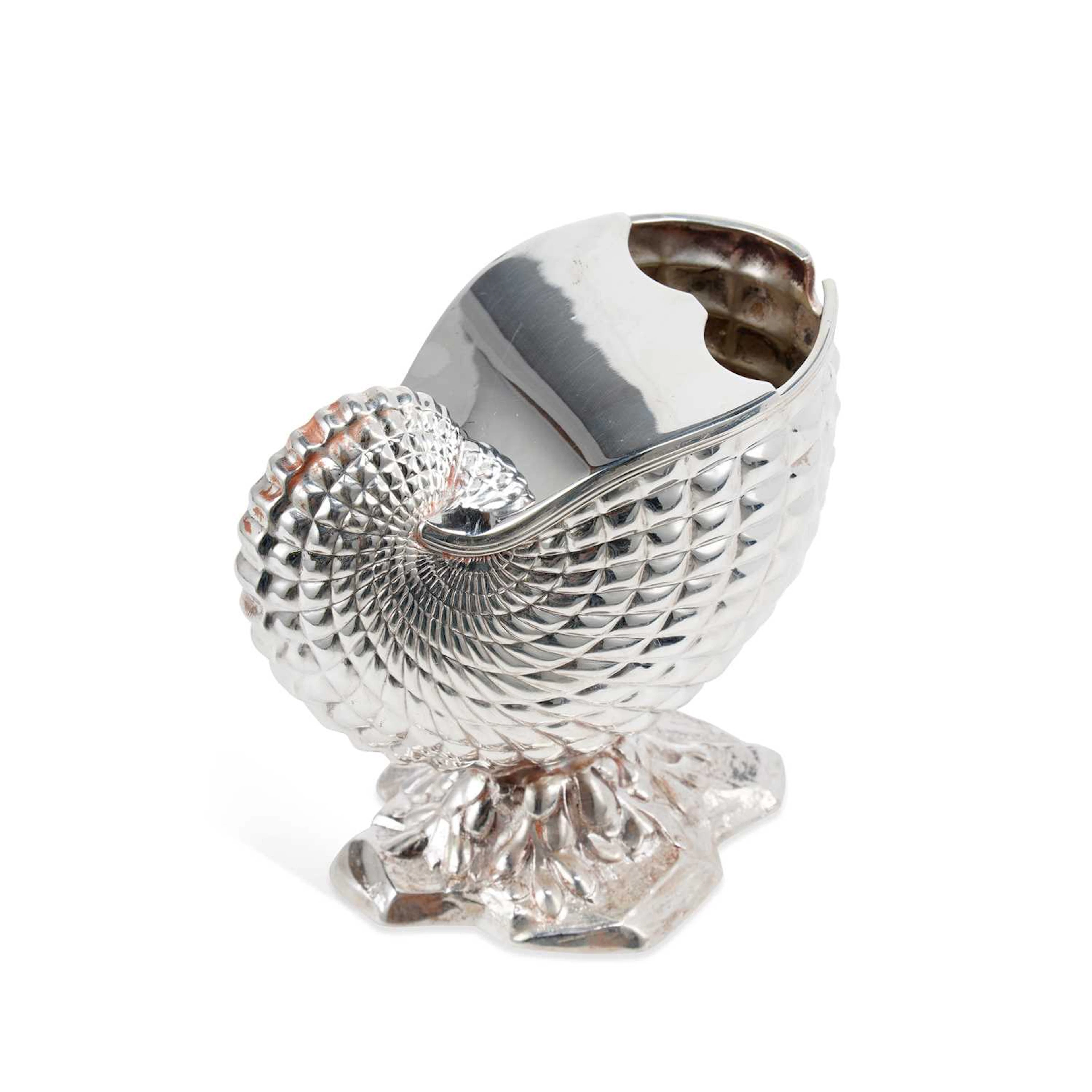 A SILVER-PLATED SPOON WARMER IN THE FORM OF A NAUTILUS