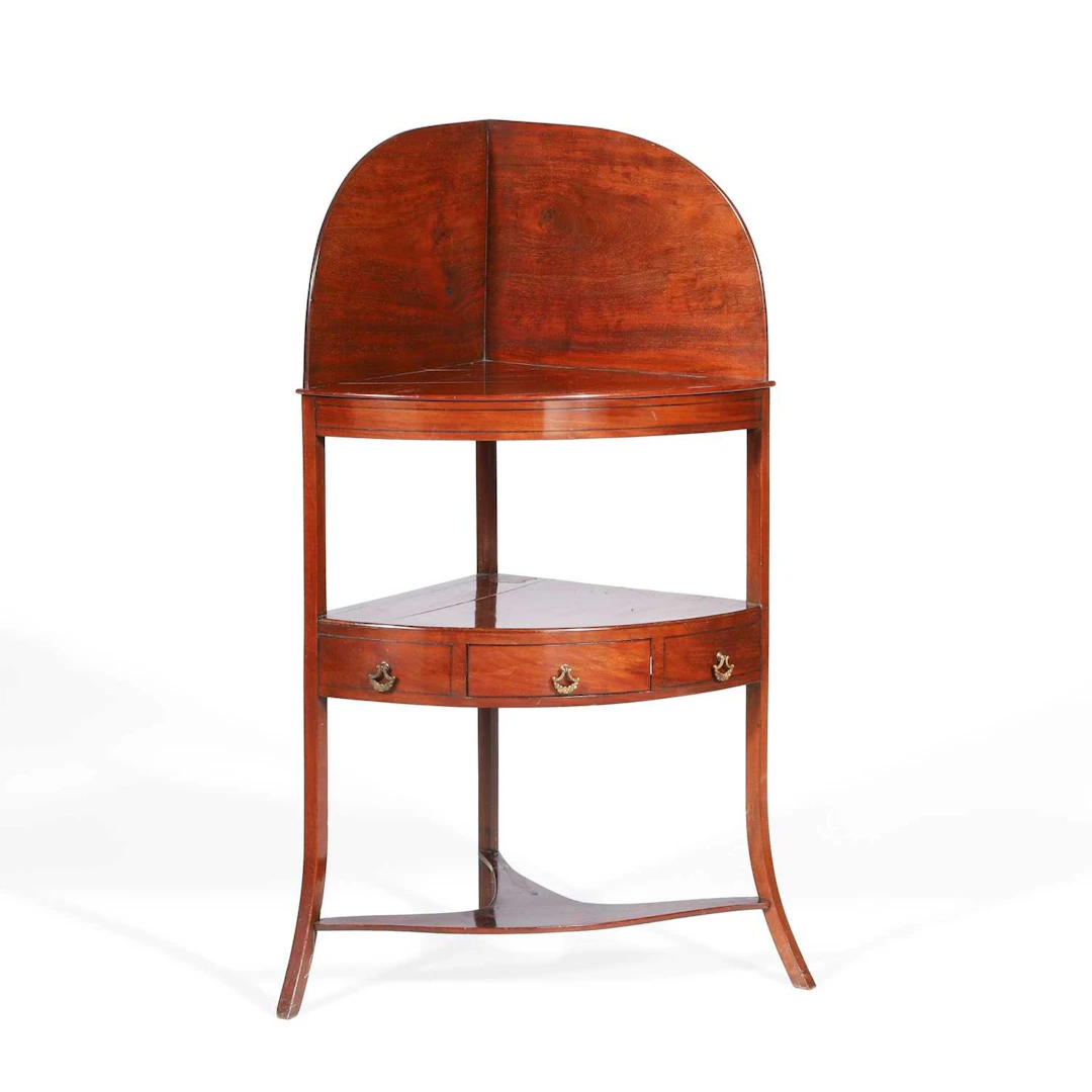 A GEORGE III MAHOGANY CORNER WASHSTAND