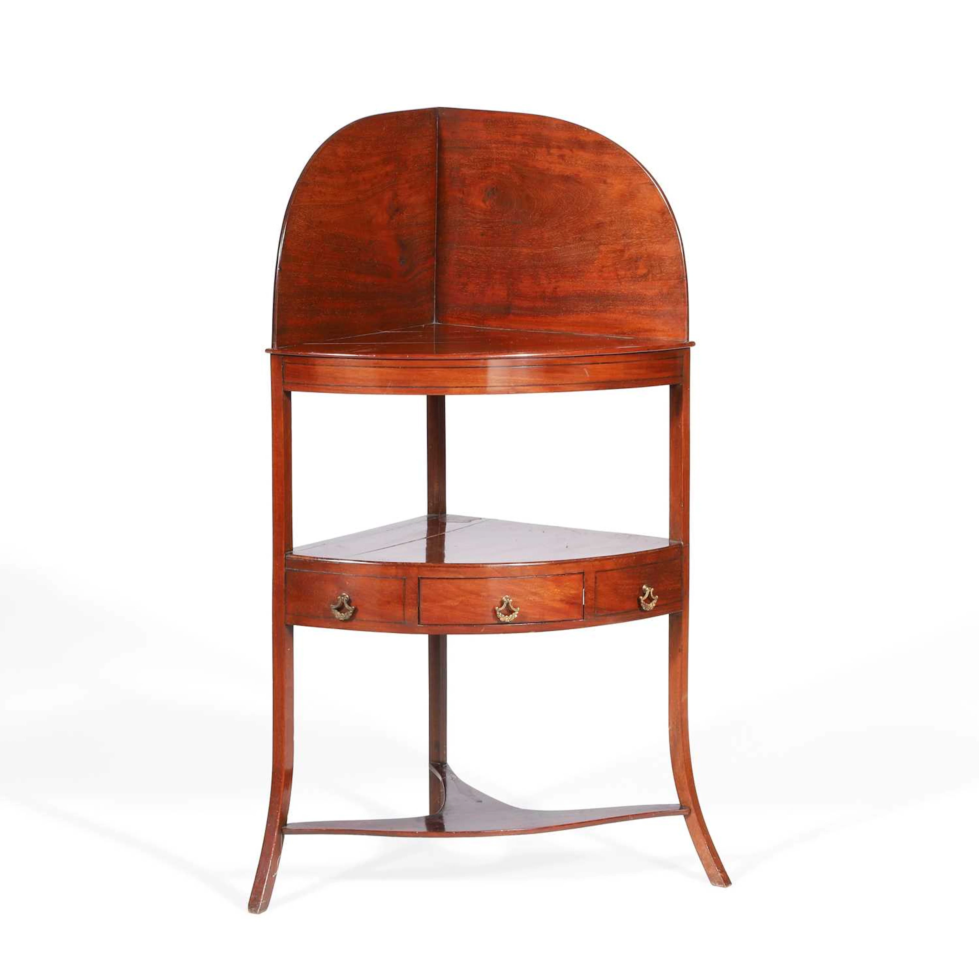 A GEORGE III MAHOGANY CORNER WASHSTAND