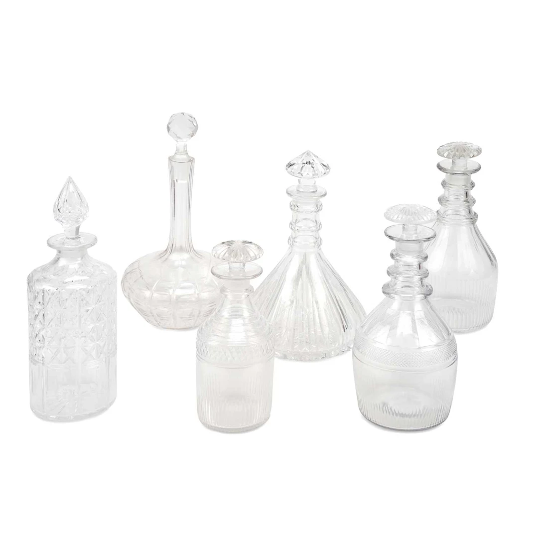 A GROUP OF 19TH CENTURY CUT-GLASS DECANTERS