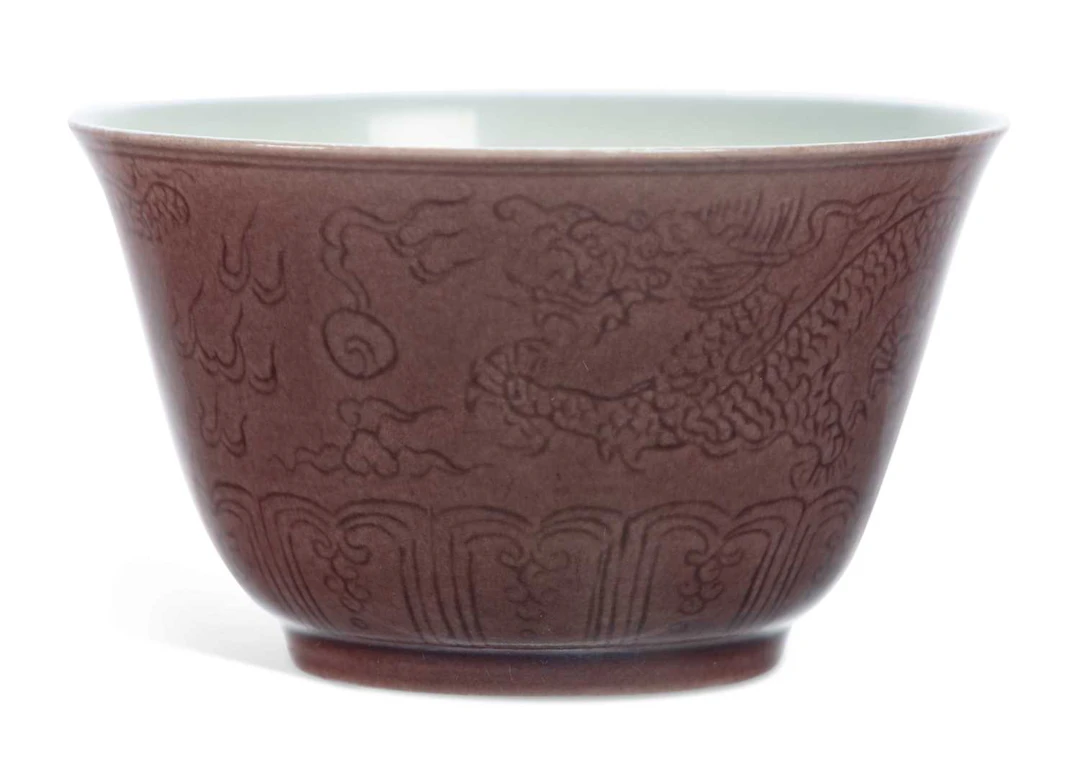A CHINESE COPPER RED GLAZED CUP BEARING YONGZHENG SIX CHARACTER MARK