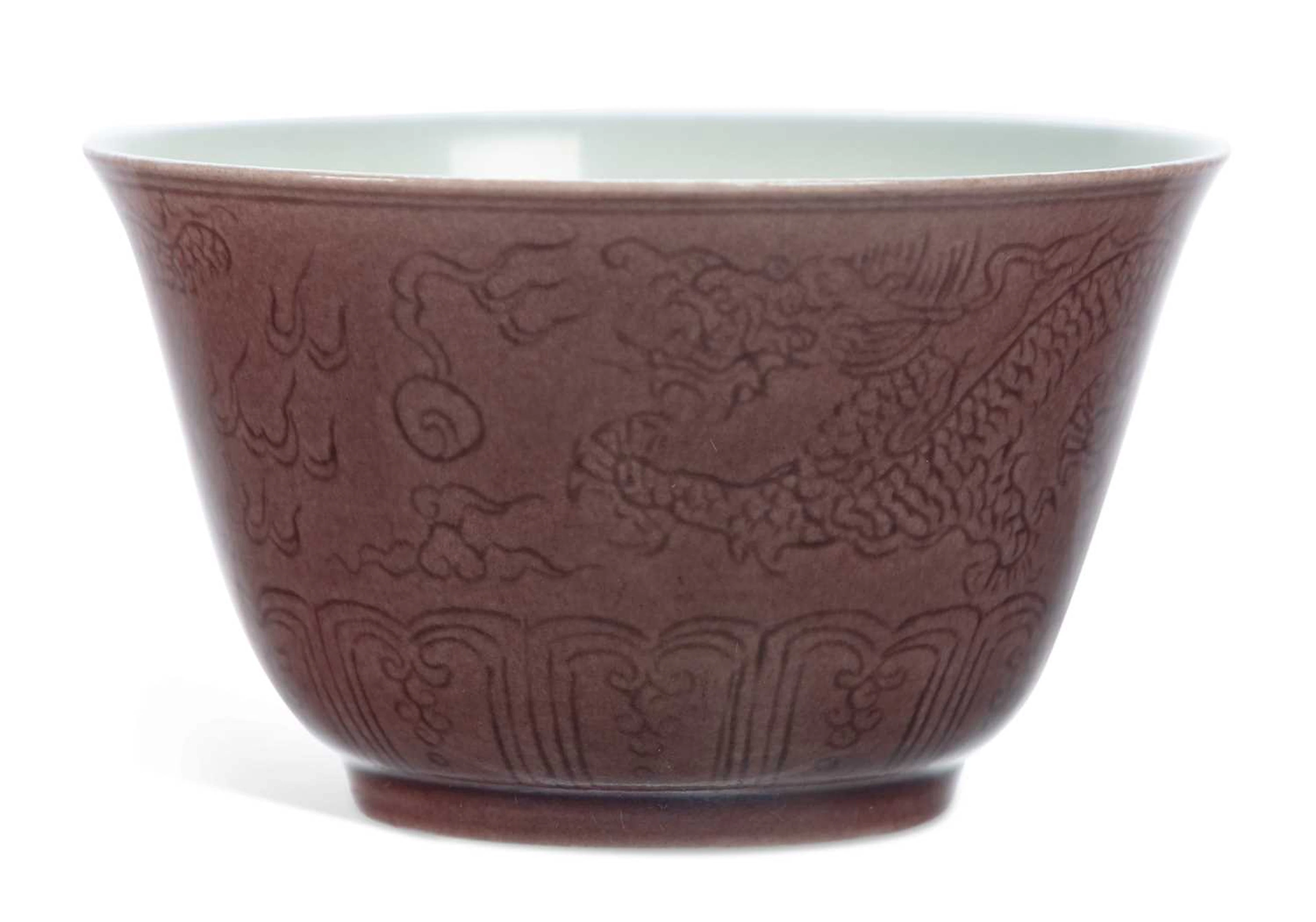 A CHINESE COPPER RED GLAZED CUP BEARING YONGZHENG SIX CHARACTER MARK