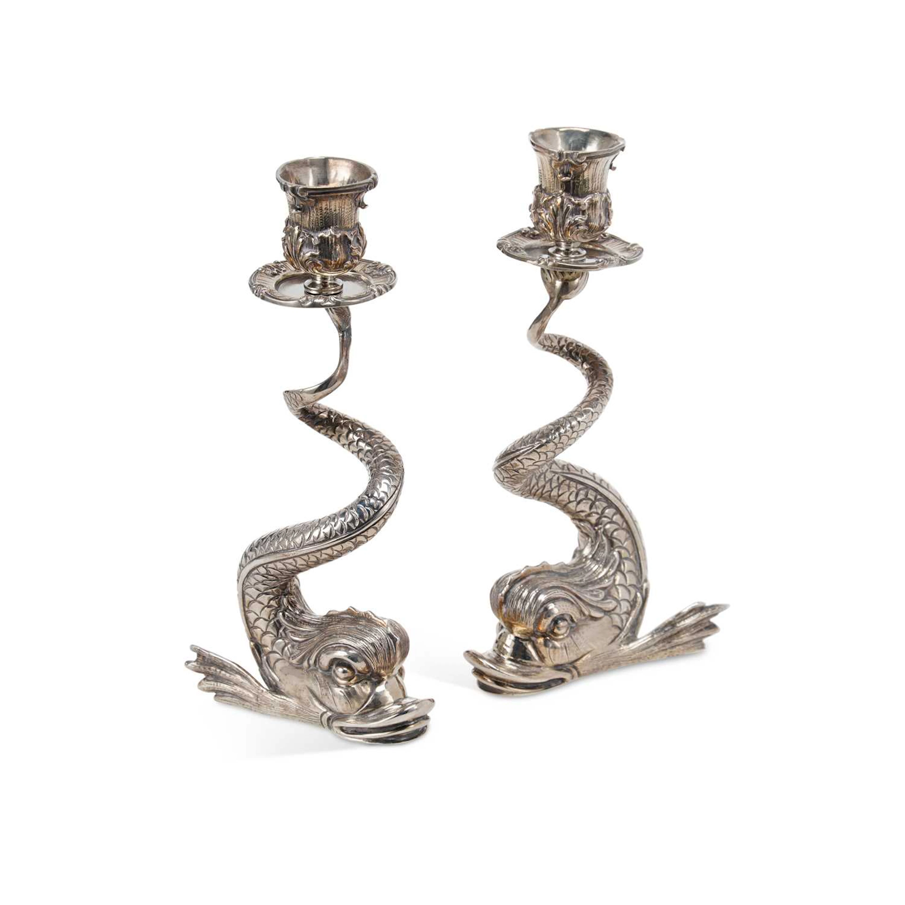A PAIR OF SILVER FABERGÉ CANDLESTICKS