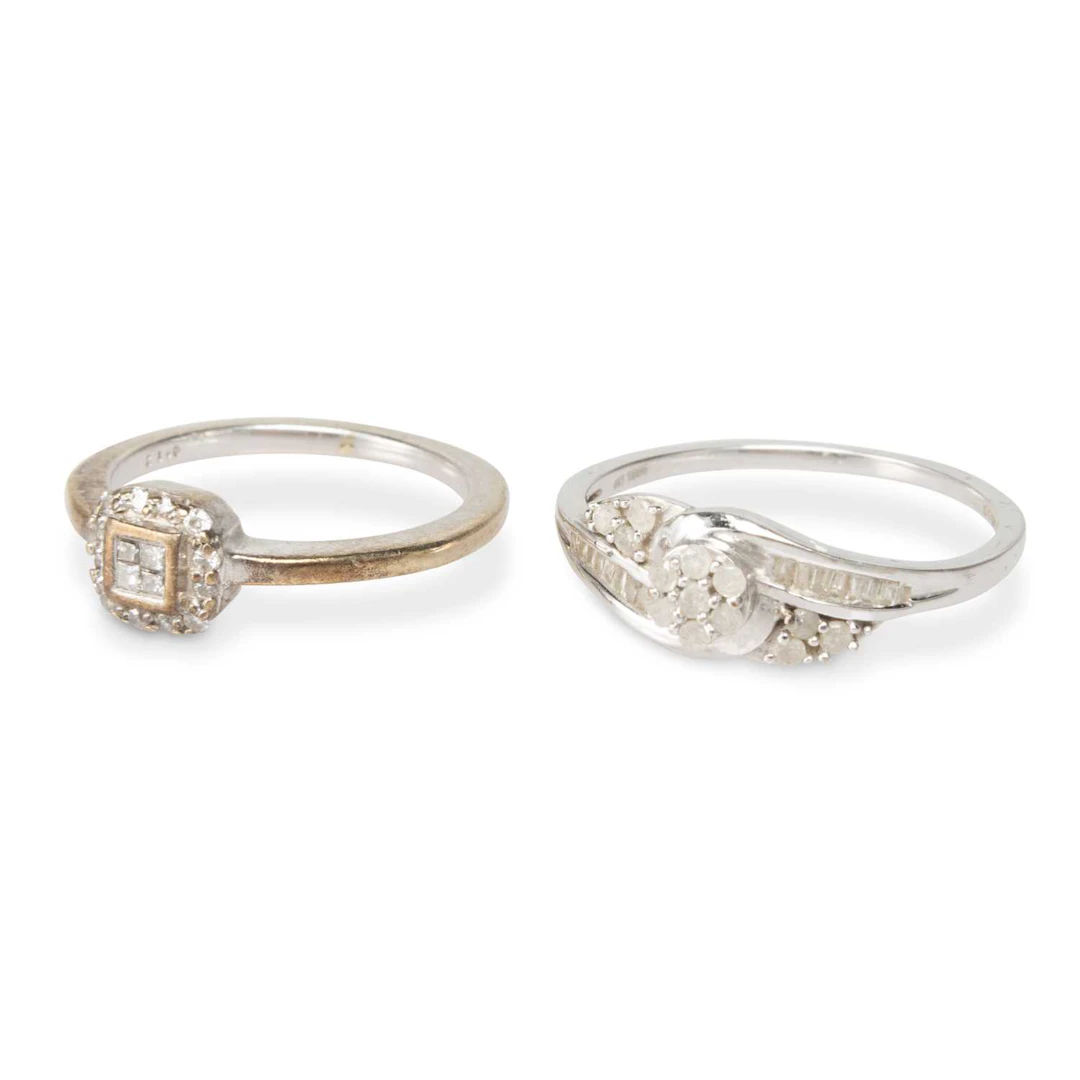 TWO 9 CARAT WHITE GOLD DIAMOND RINGS