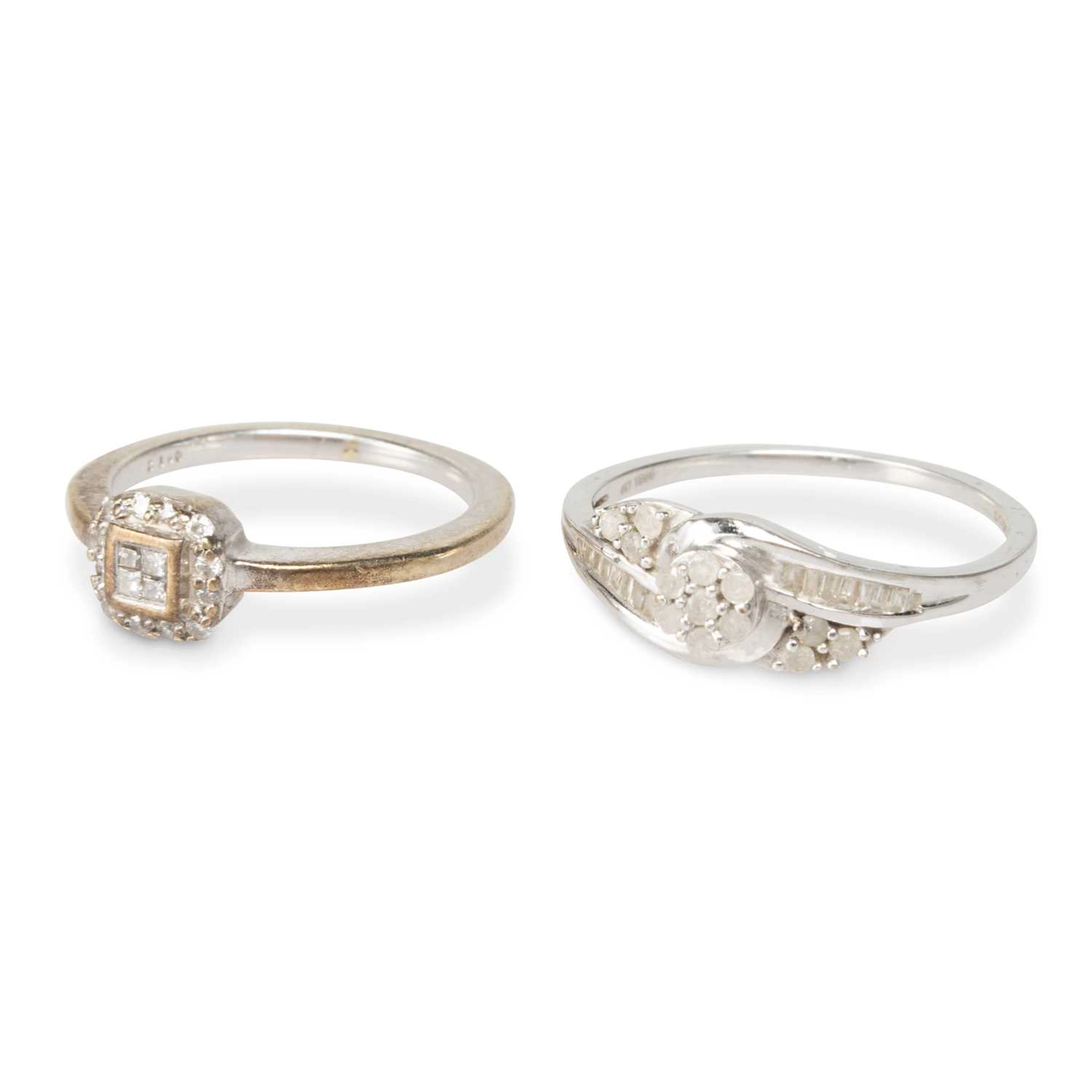 TWO 9 CARAT WHITE GOLD DIAMOND RINGS