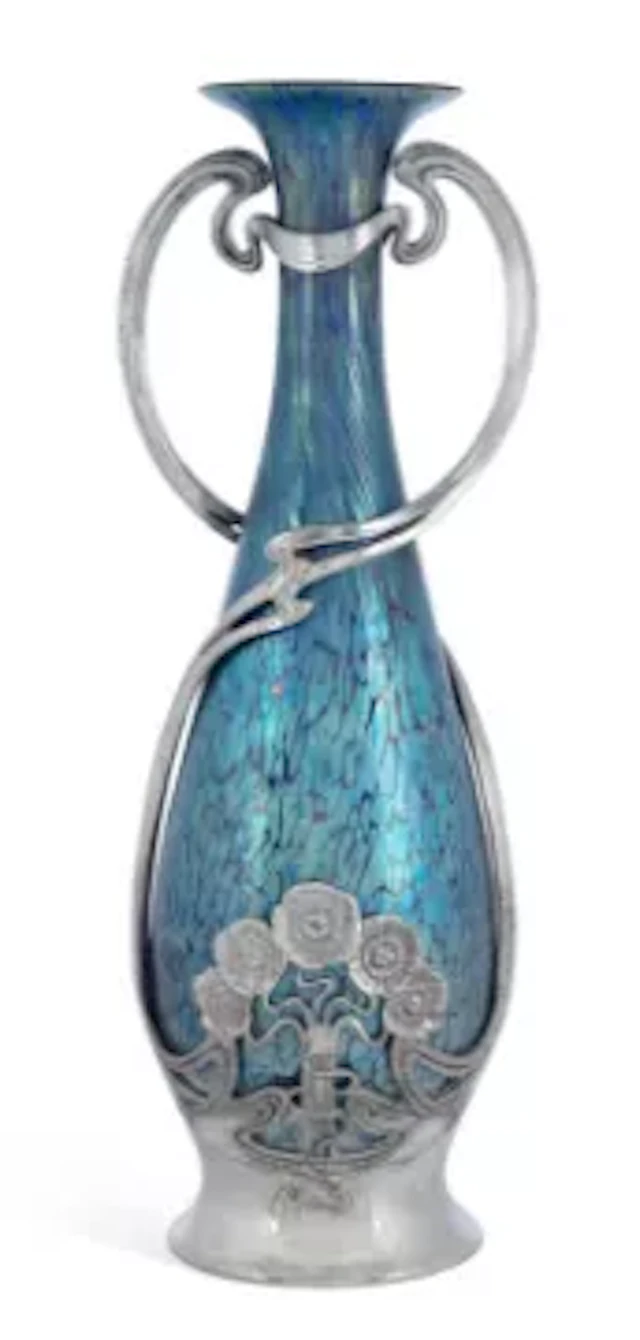 A LOETZ IRIDESCENT GLASS VASE IN AN ART NOUVEAU PEWTER MOUNT CIRCA 1900