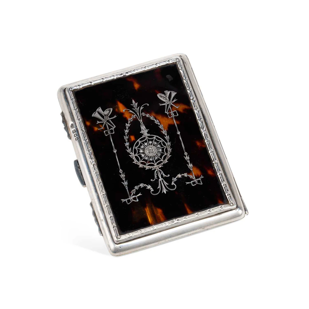 A GEORGE V SILVER AND TORTOISESHELL CARD CASE
