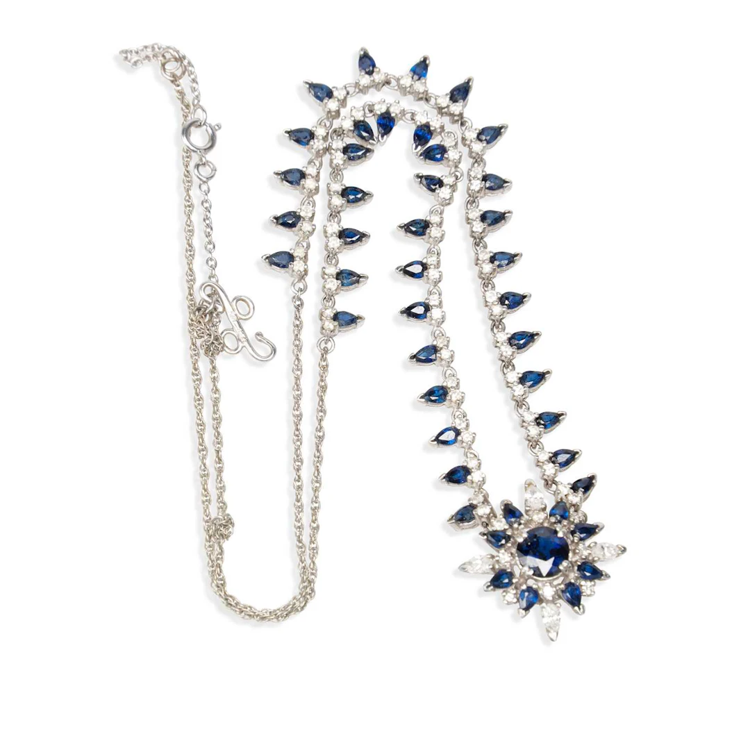 AN 18 CARAT WHITE GOLD SAPPHIRE AND DIAMOND NECKLACE