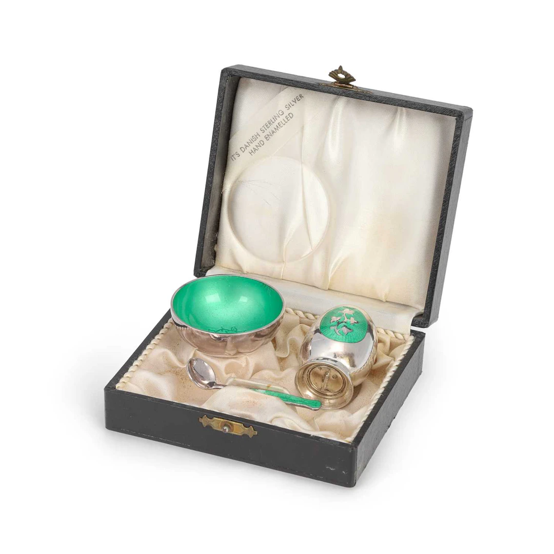 A DANISH SILVER AND ENAMEL SALT AND PEPPER SET