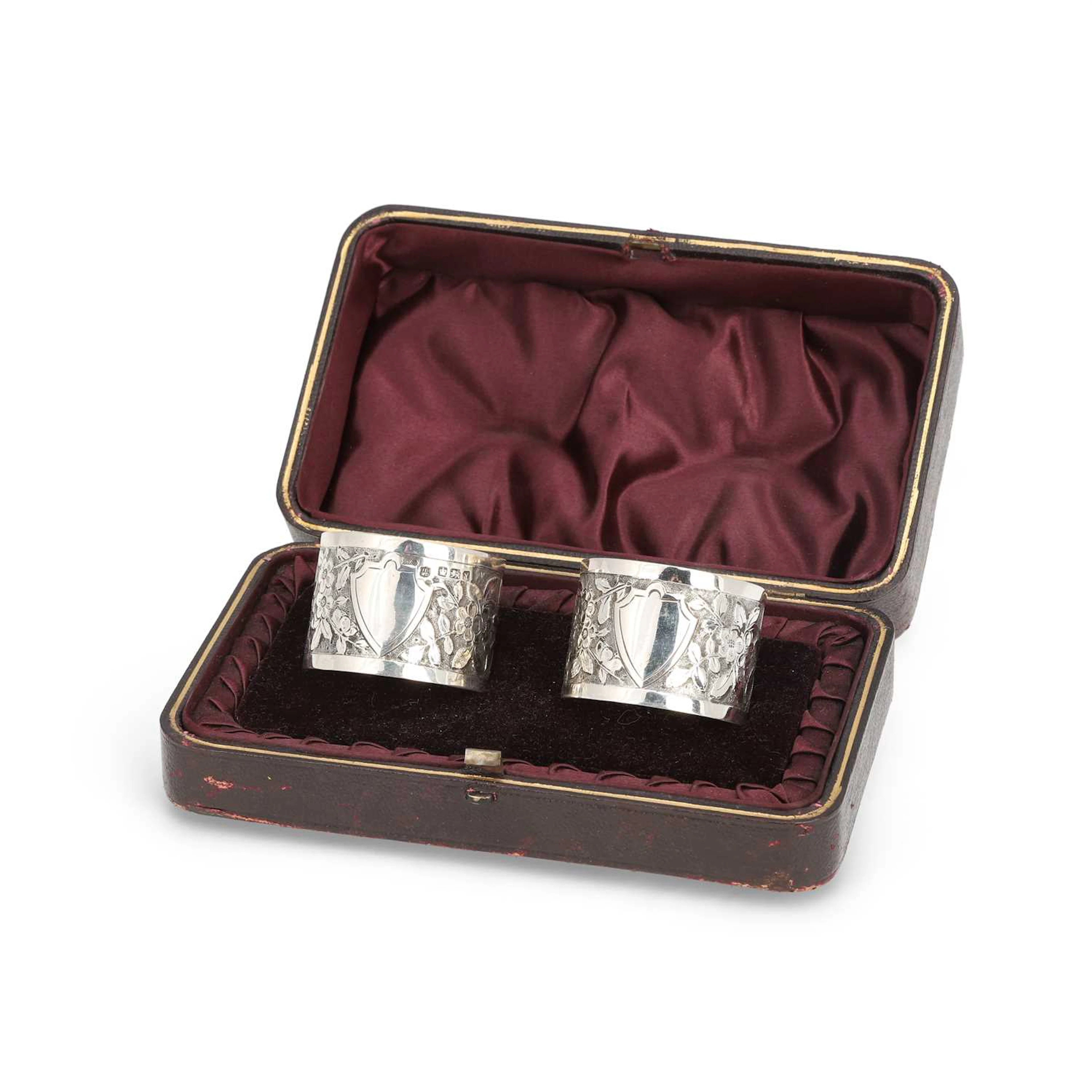 A PAIR OF LATE VICTORIAN SILVER NAPKIN RINGS