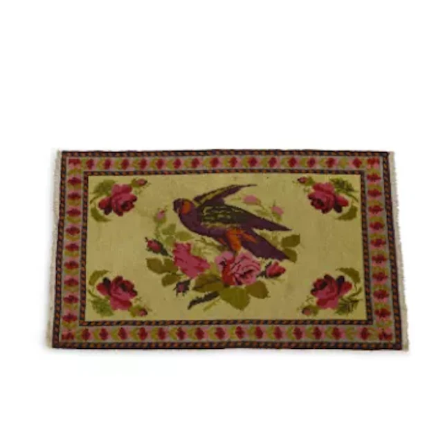 A SMALL WOOL RUG IN THE CHINESE TASTE