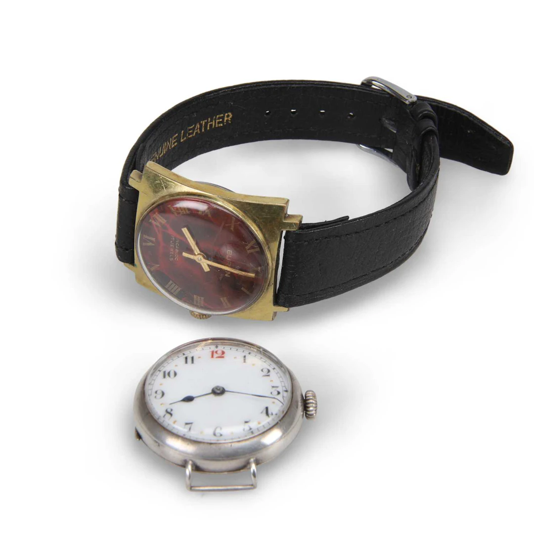 A SILVER TRENCH WATCH AND A BUREN STRAP WATCH