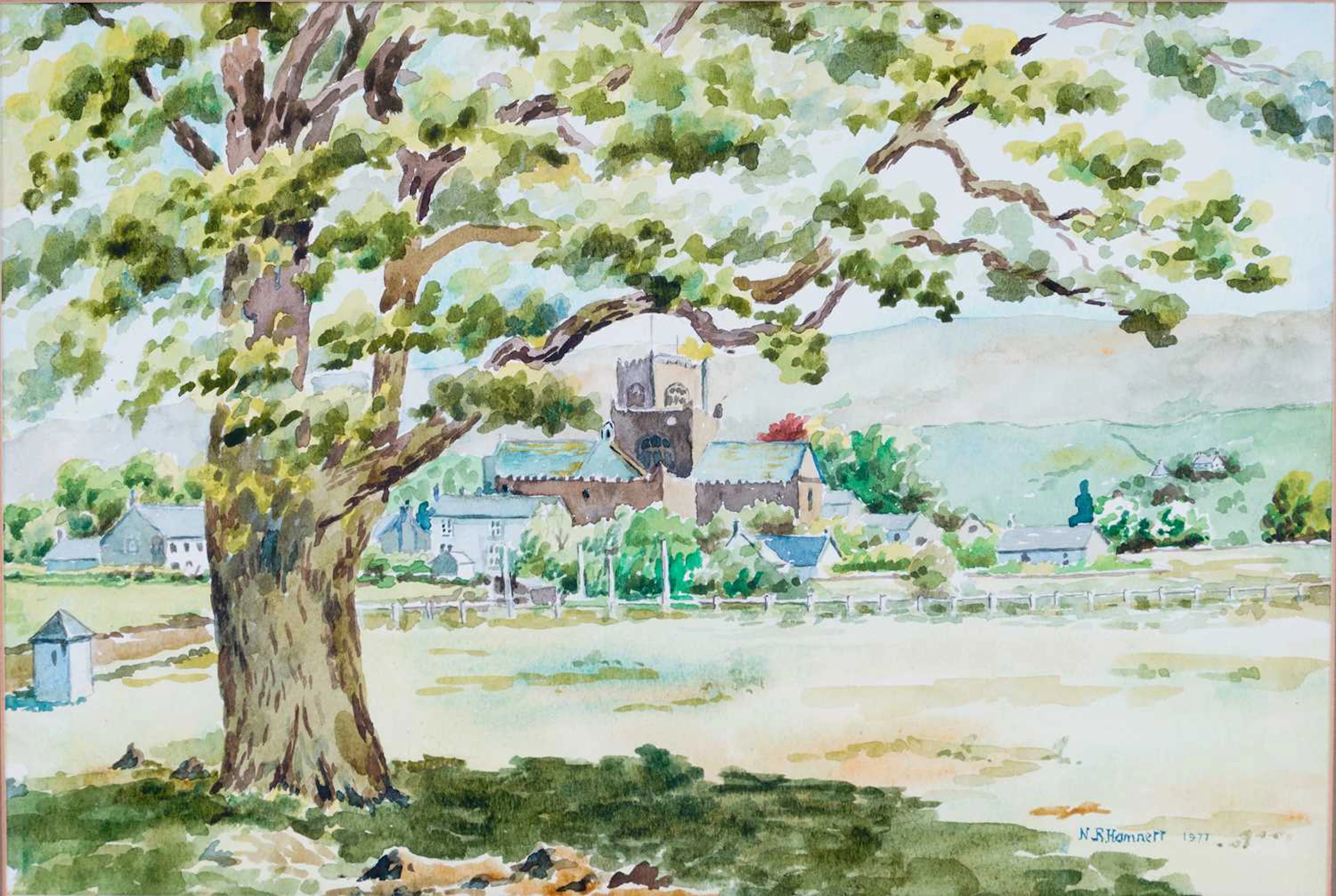 ‡ N R HAMNETT (20TH CENTURY) A LANDSCAPE WITH VILLAGE CHURCH, POSSIBLY