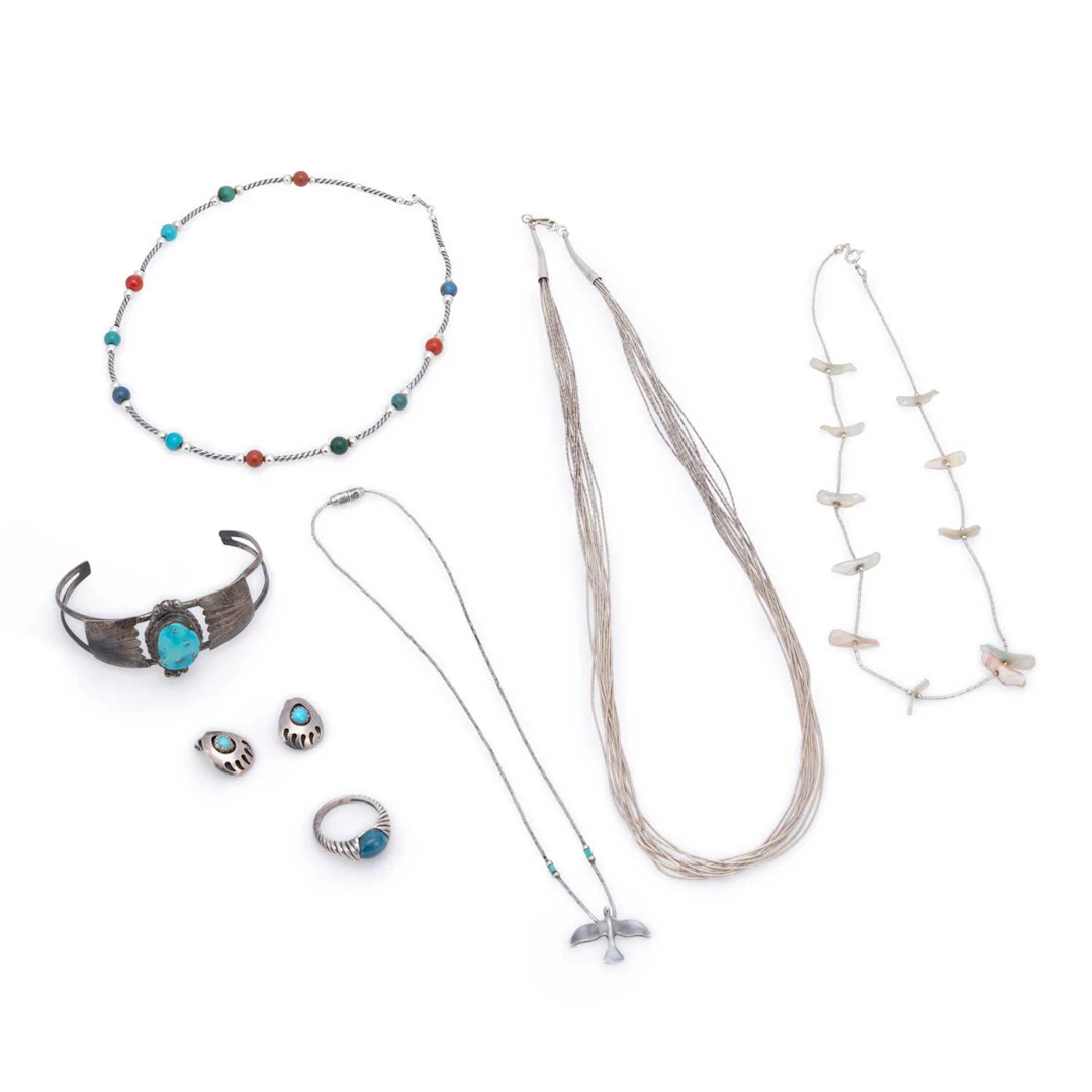 A COLLECTION OF NATIVE AMERICAN NAVAJO SILVER JEWELLERY