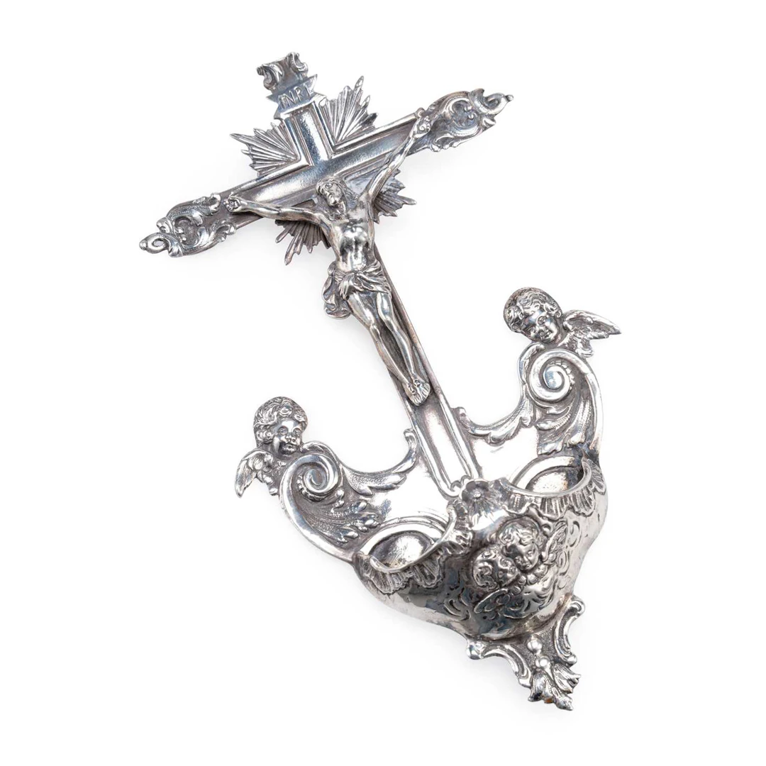 A CONTINENTAL SILVER HOLY WATER-STOUP CRUCIFIX