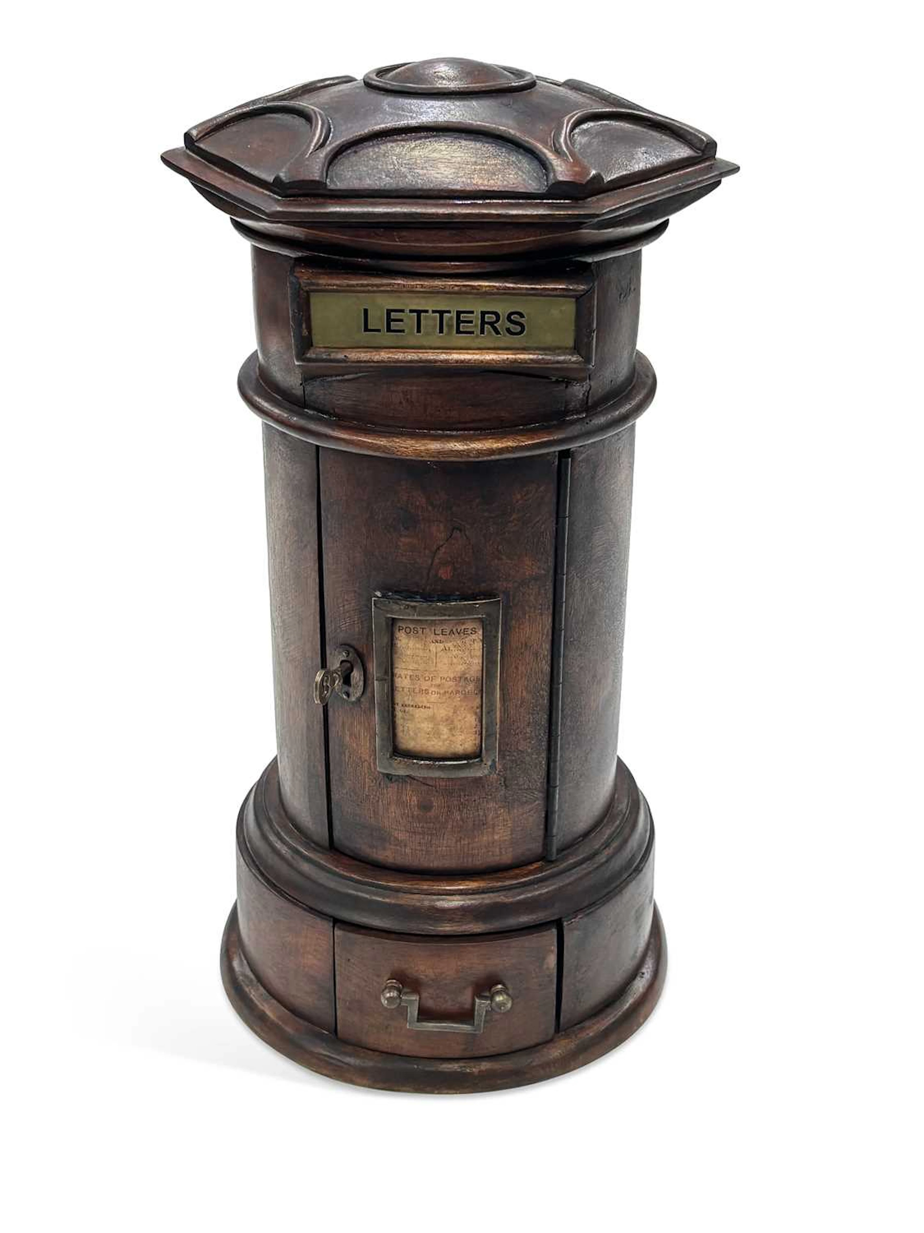 A MAHOGANY COUNTRY HOUSE LETTER BOX