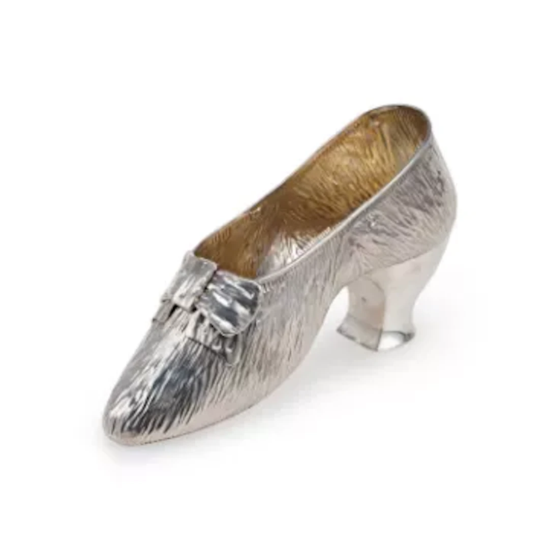 A LATE VICTORIAN SILVER MODEL OF A SHOE
