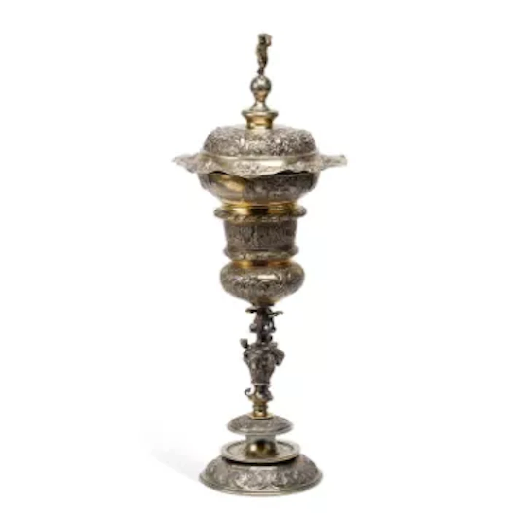 A CONTINENTAL SILVER AND SILVER-GILT STANDING CUP AND COVER