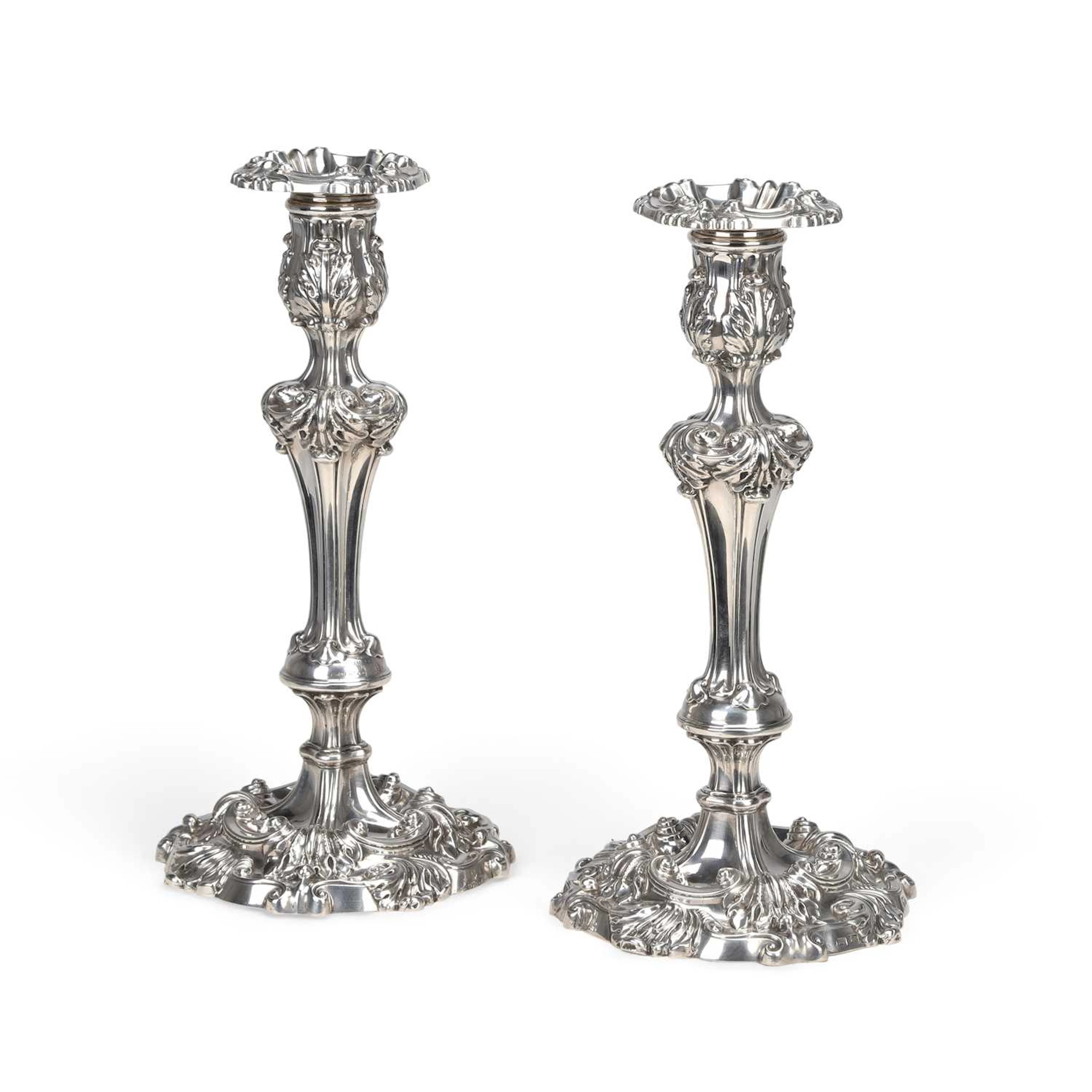 A PAIR OF GEORGE III SILVER CANDLESTICKS