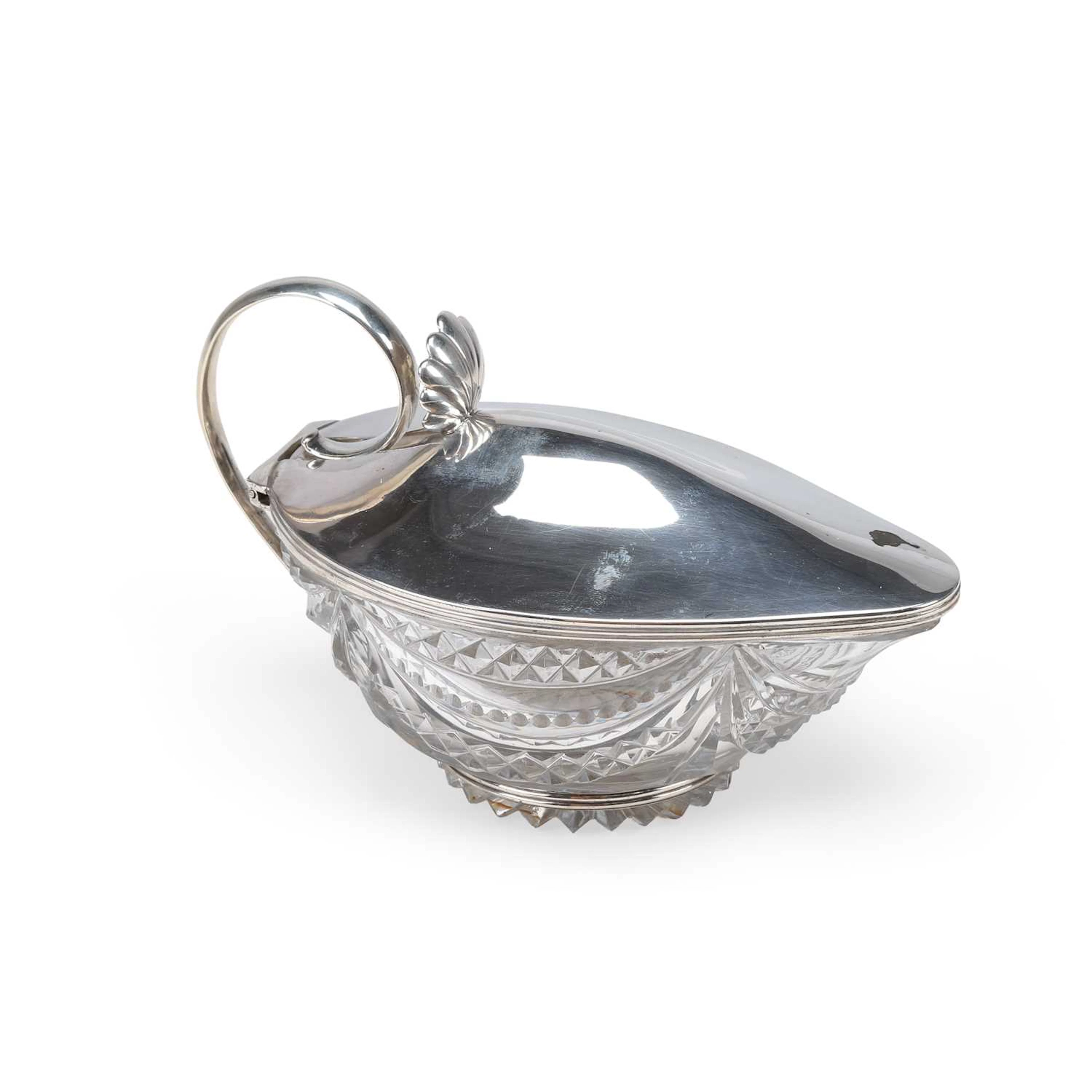 A GEORGE III SILVER-MOUNTED CUT-GLASS SAUCE BOAT