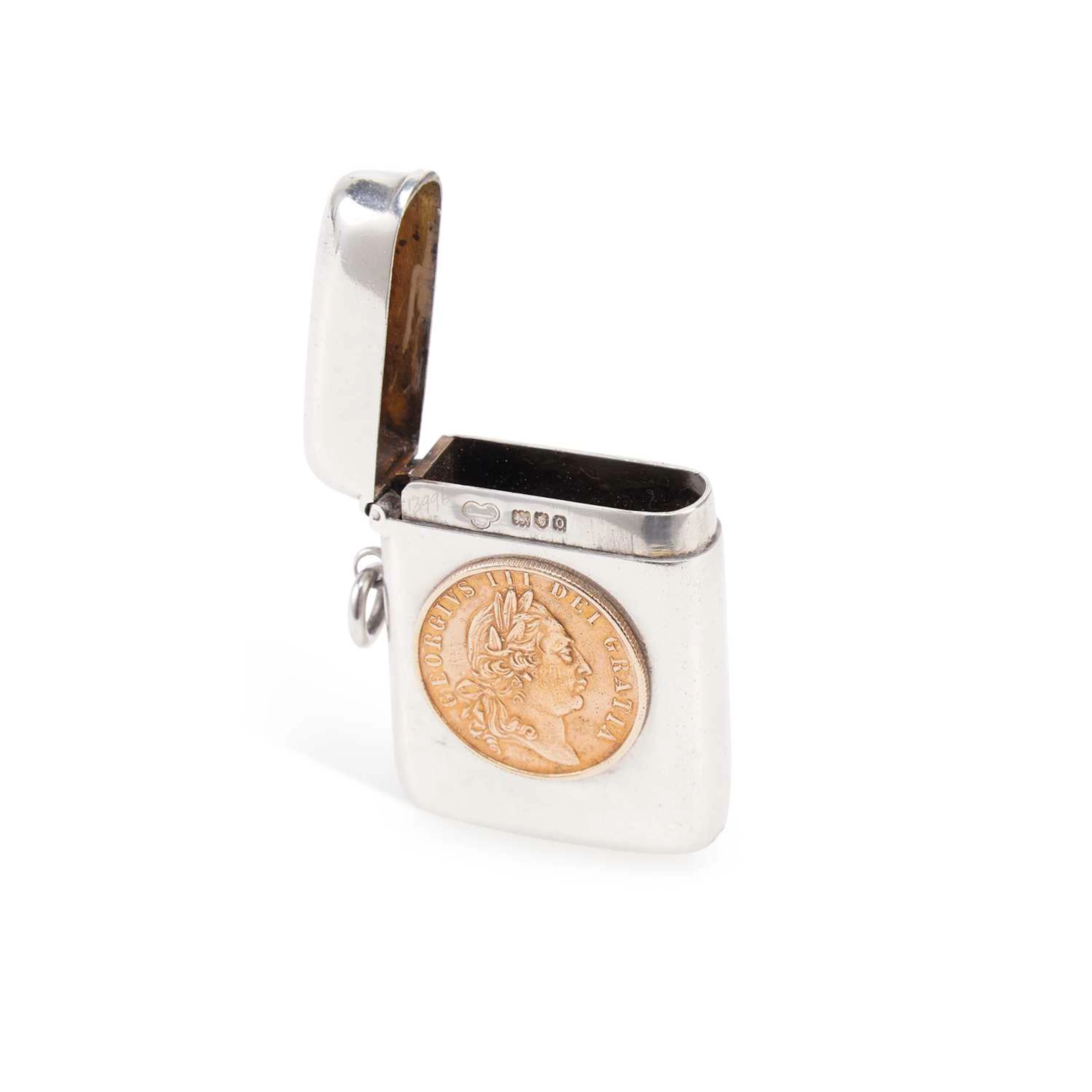 AN EDWARDIAN SILVER VESTA CASE