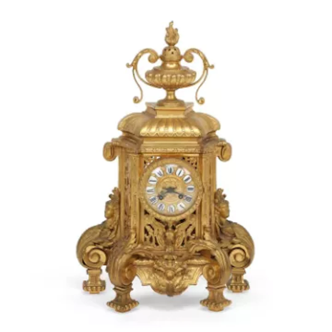 A FRENCH GILT BRONZE MANTEL CLOCK