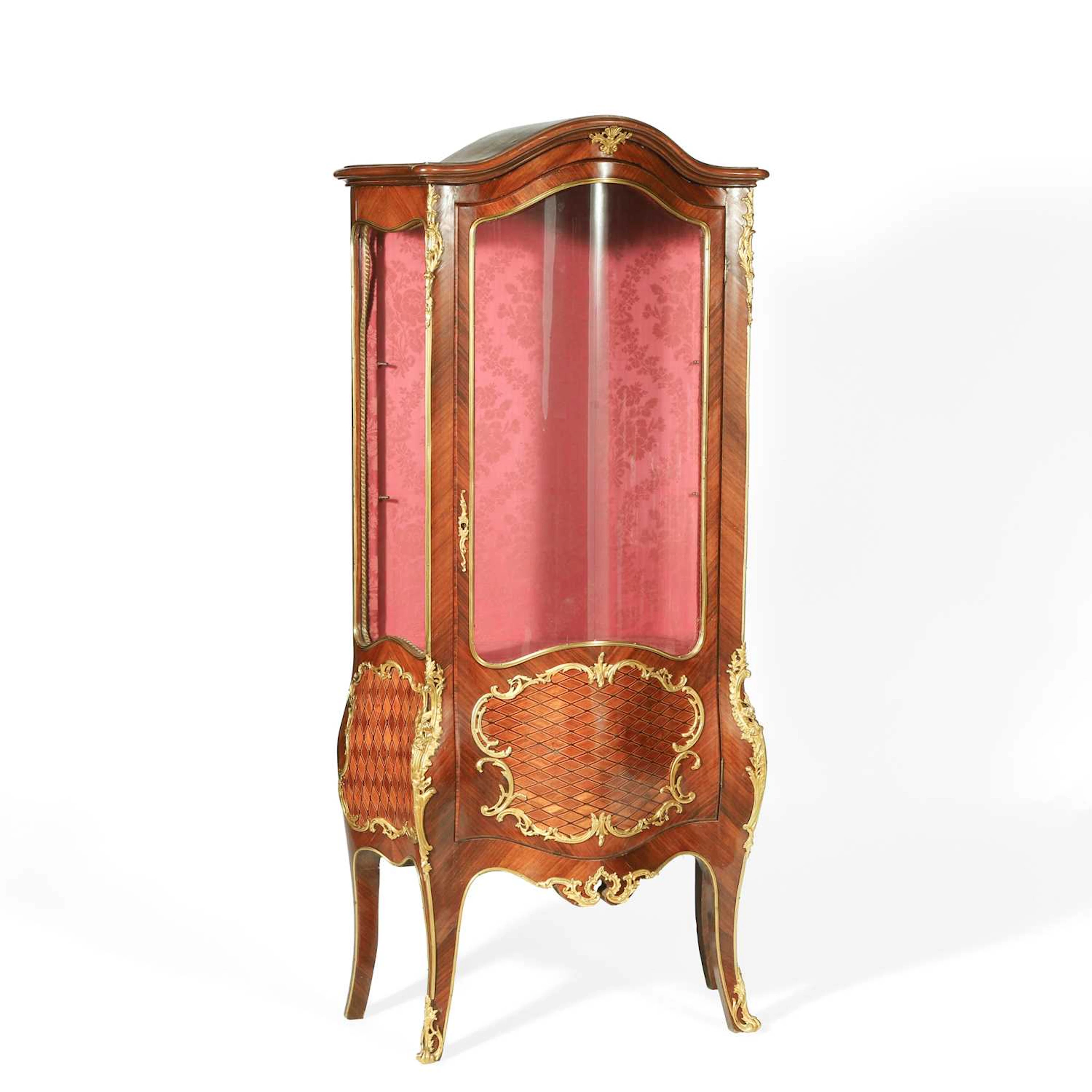 A LOUIS XV STYLE KINGWOOD AND PARQUETRY GILT METAL MOUNTED BOMBÉ VITRINE