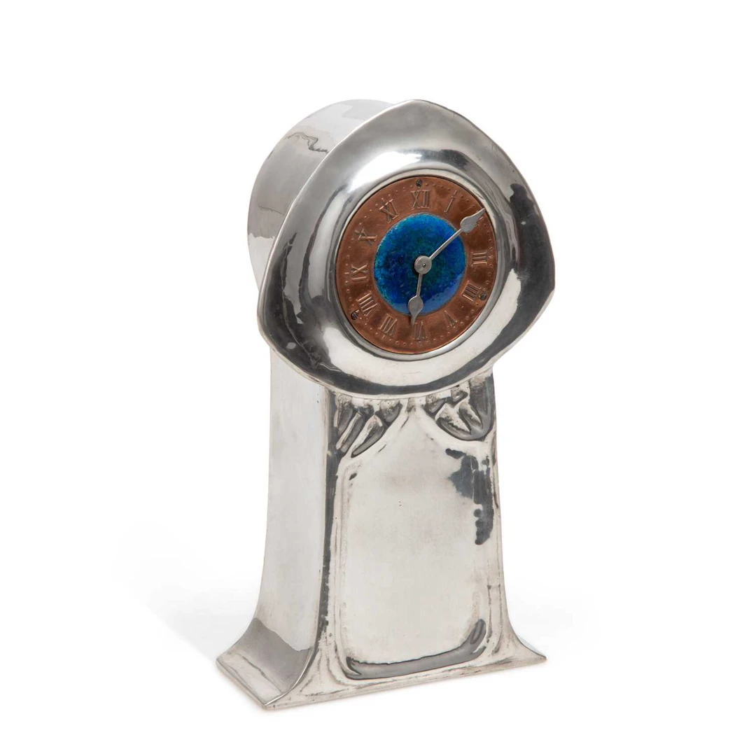 A LIBERTY & CO TUDRIC PEWTER AND ENAMEL MANTEL CLOCK DESIGNED BY DAVID VEASEY