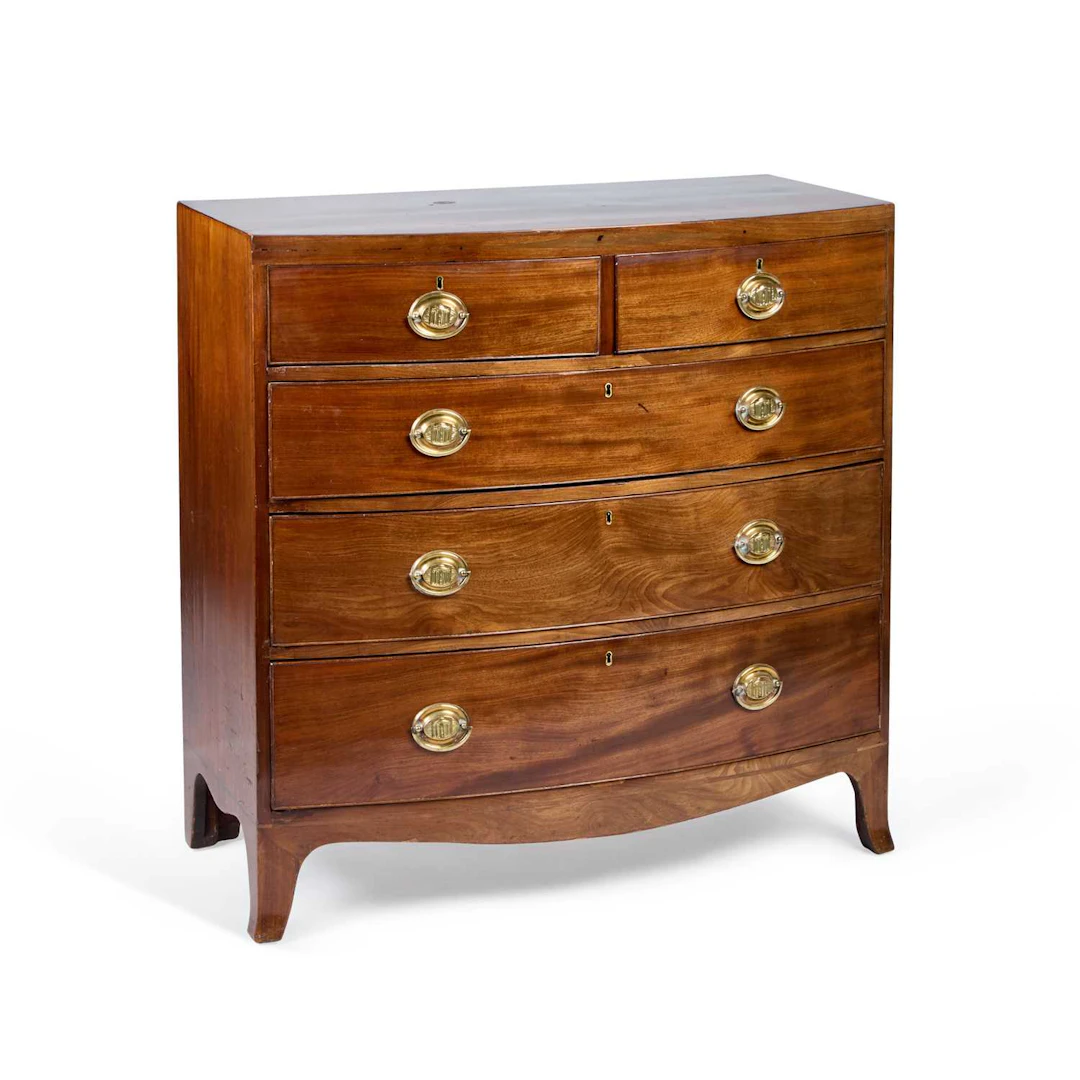 A REGENCY MAHOGANY BOW-FRONT CHEST OF DRAWERS