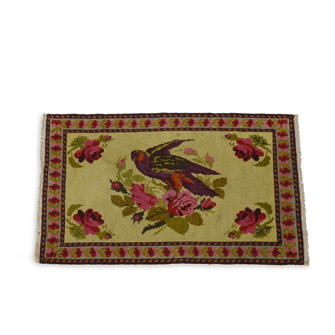 A SMALL WOOL RUG IN THE CHINESE TASTE