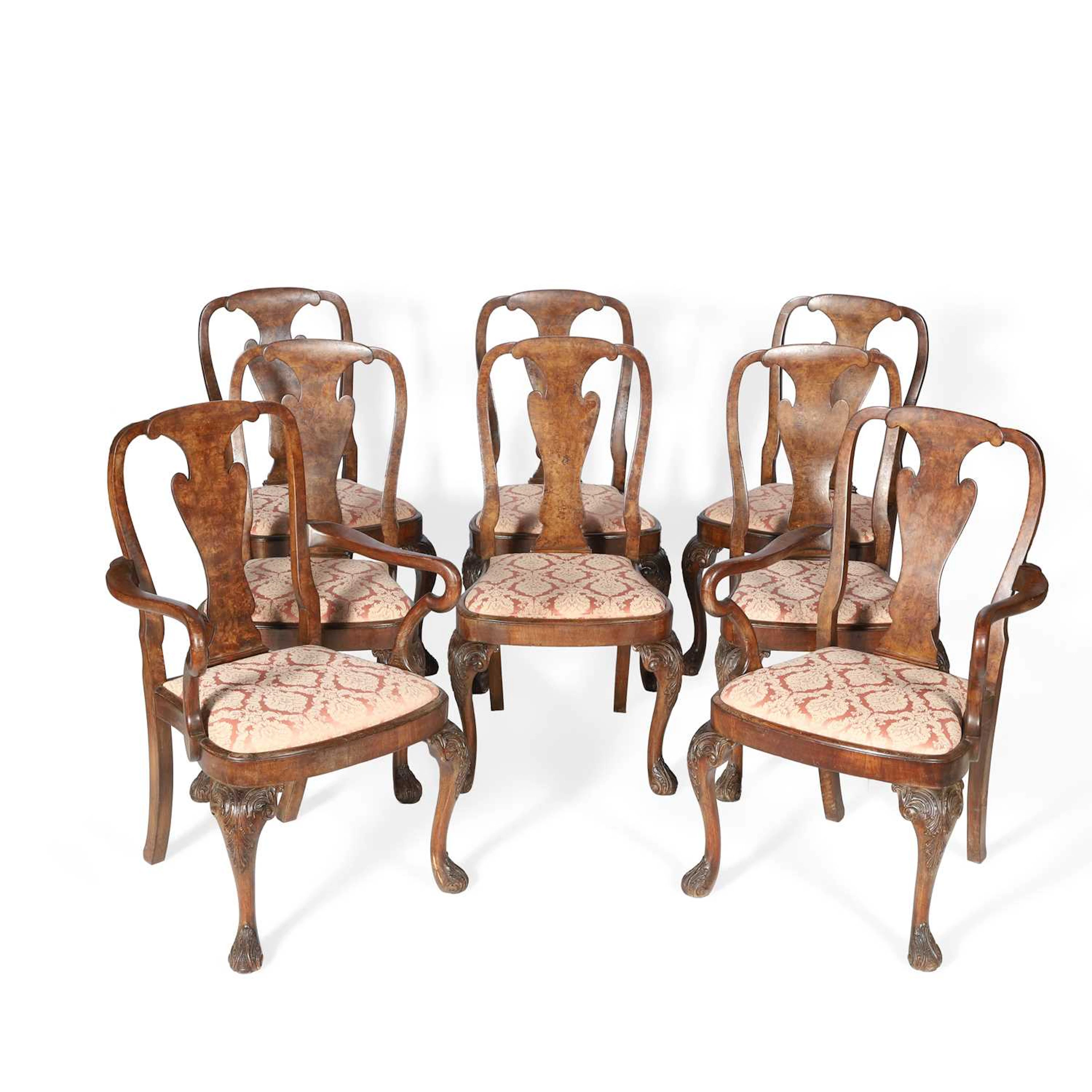 A SET OF EIGHT WALNUT DINING CHAIRS