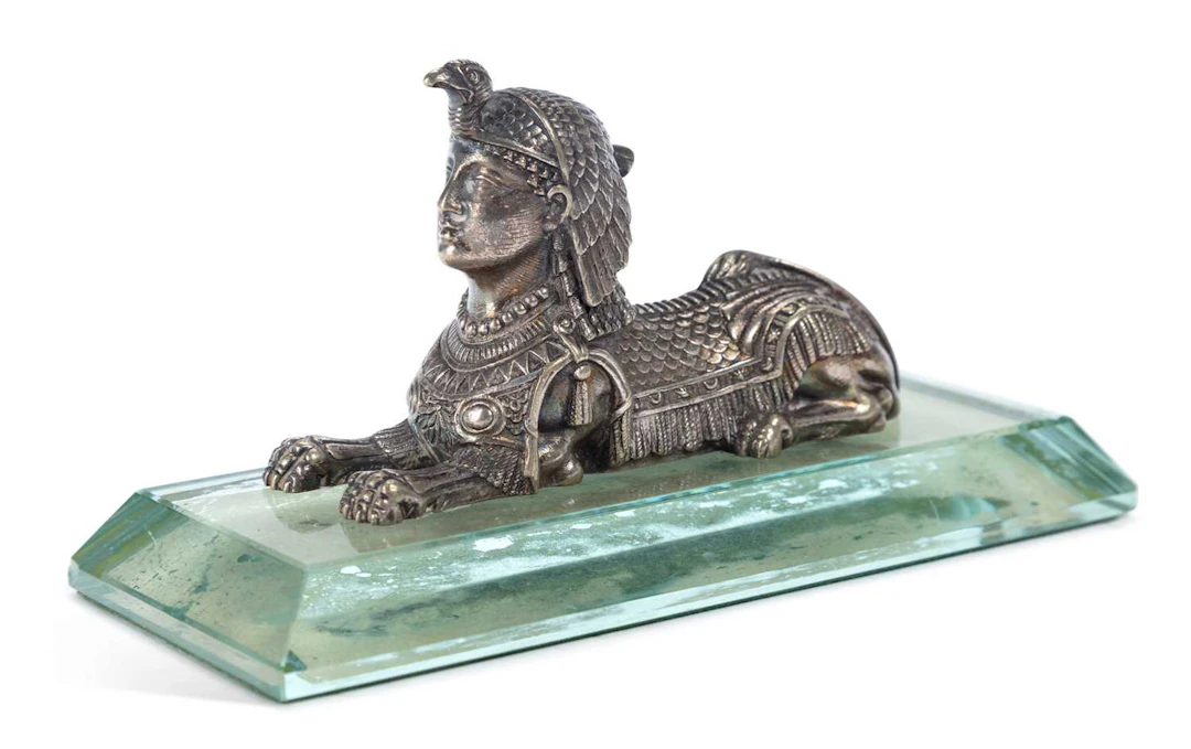 A 19TH CENTURY ENGLISH SILVER-PLATED SPHINX PAPERWEIGHT
