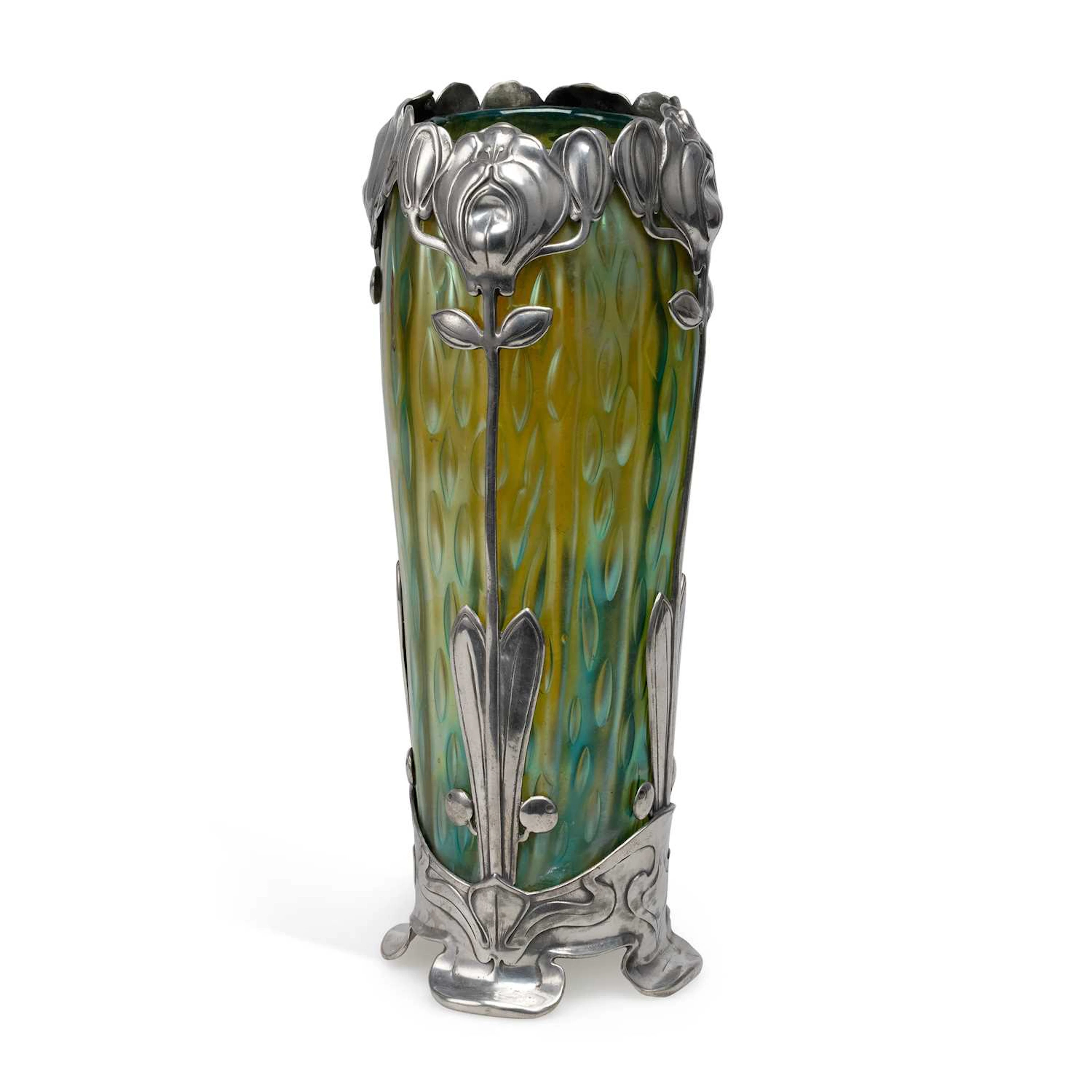 AN ART NOUVEAU IRIDESCENT GREEN GLASS VASE WITH PEWTER MOUNTS