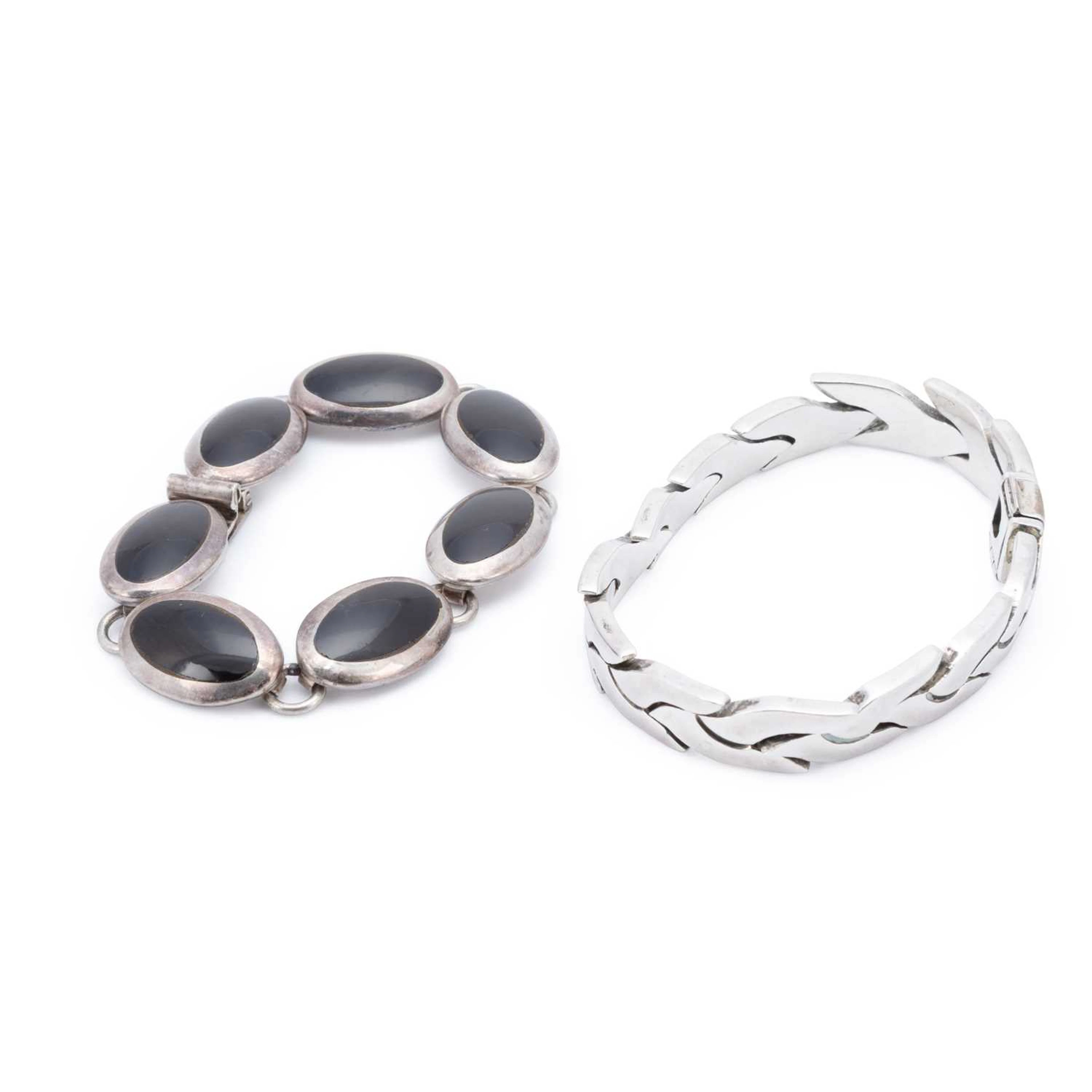 THREE SILVER BRACELETS