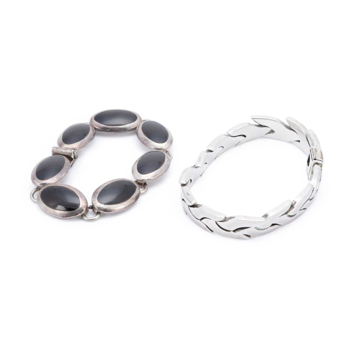 THREE SILVER BRACELETS