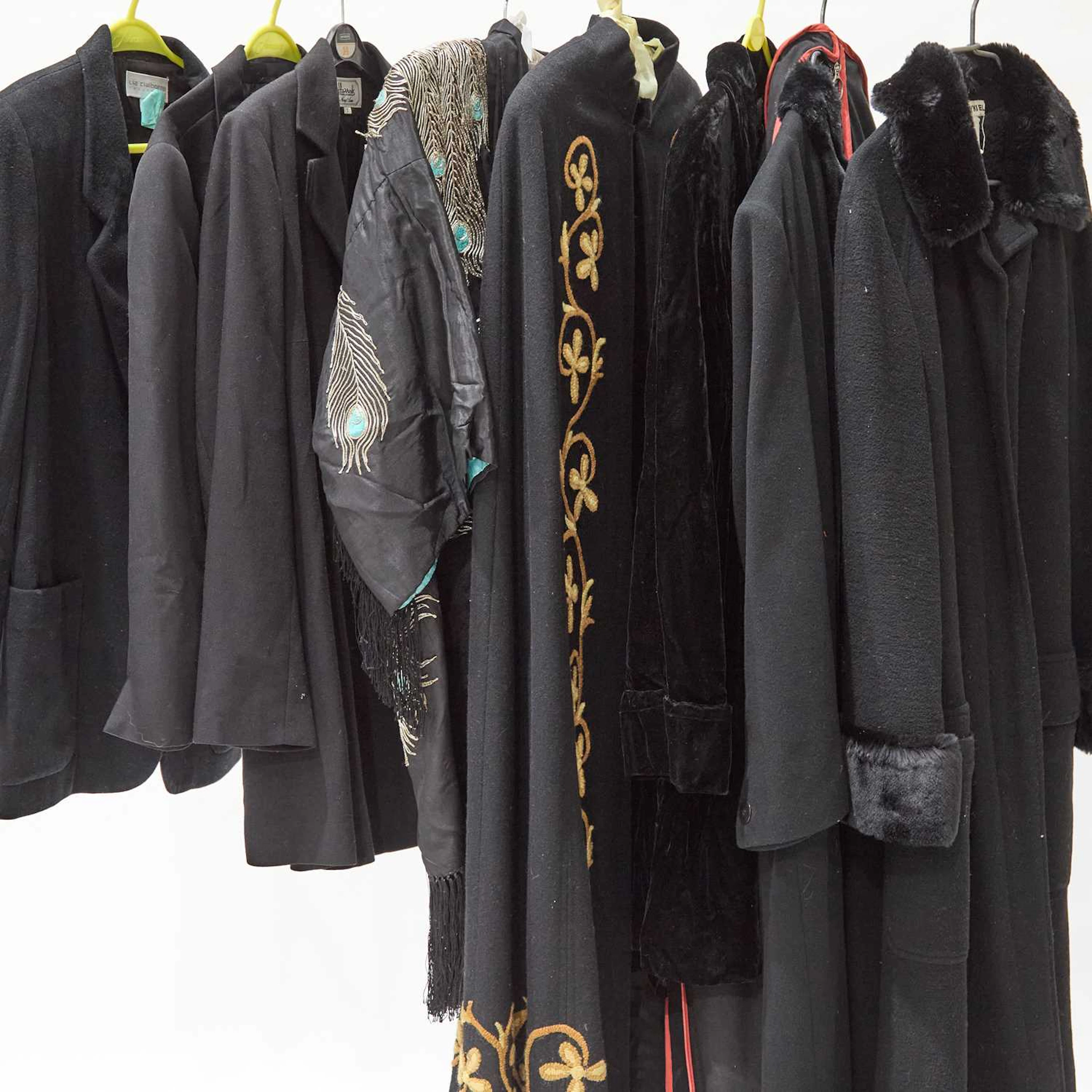 A GROUP OF COATS