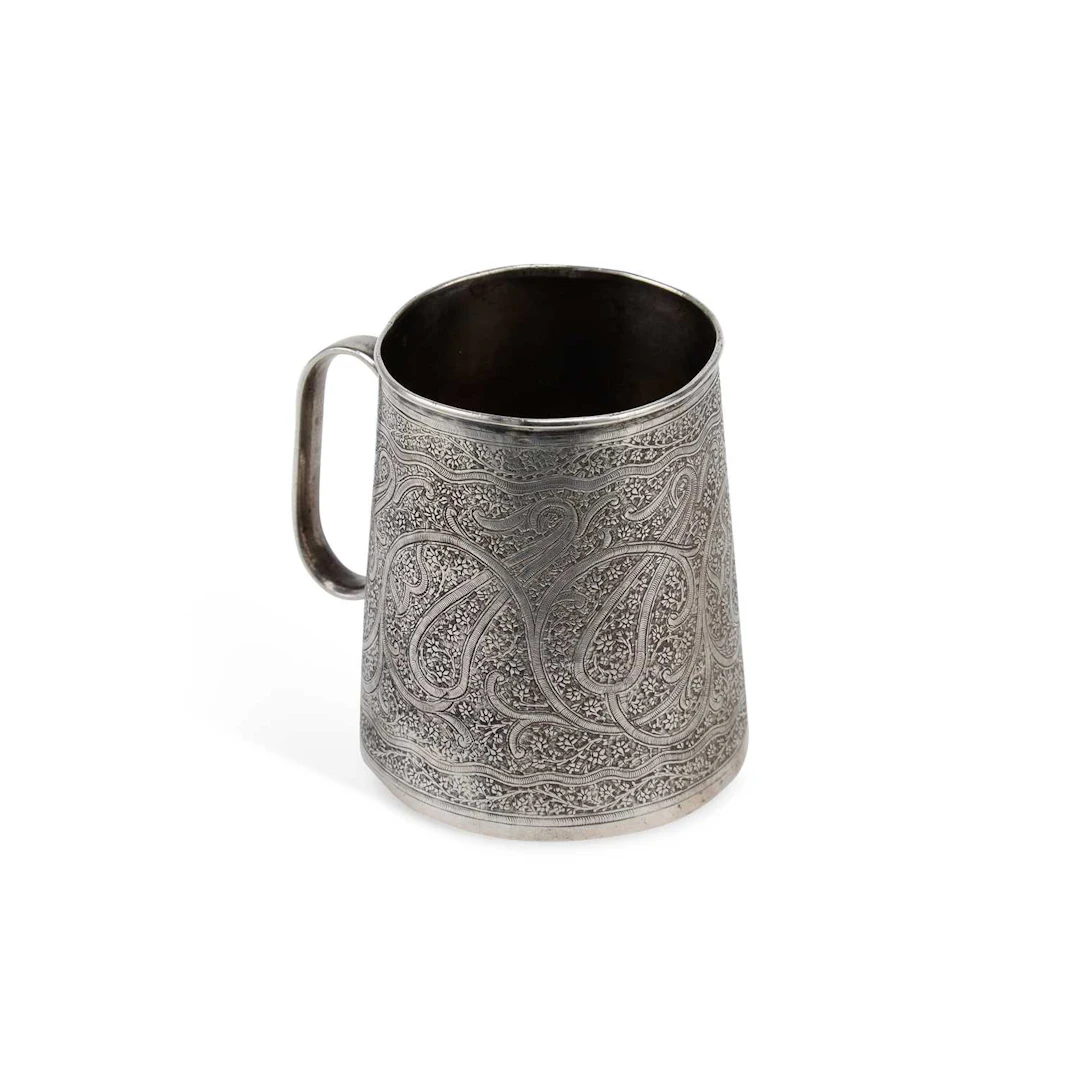 AN INDIAN SILVER MUG