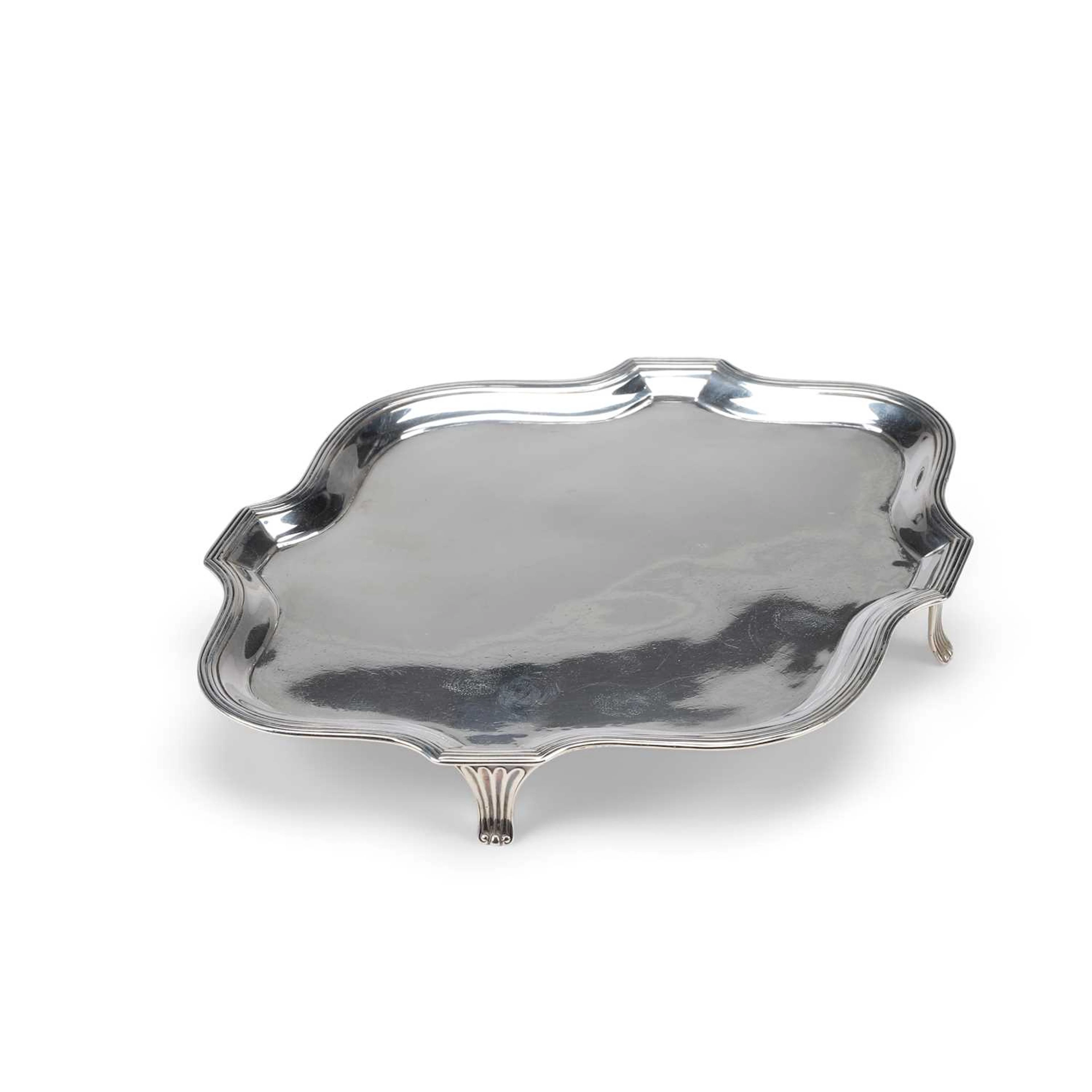 A GEORGE III SILVER TEAPOT STAND