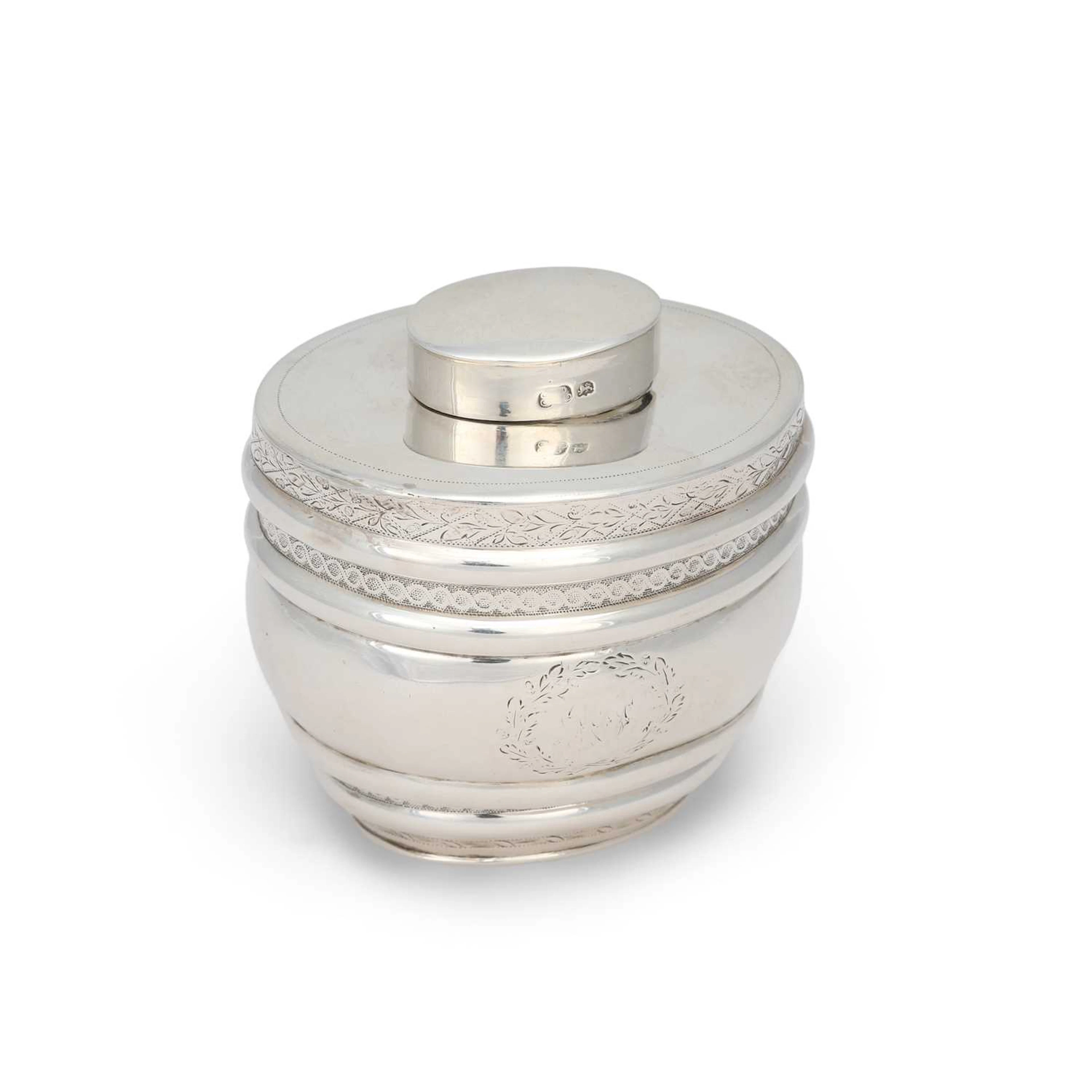 A GEORGE III SILVER TEA CADDY
