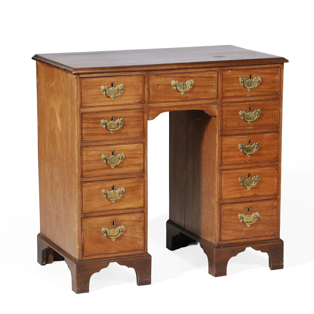 A MAHOGANY KNEEHOLE DESK