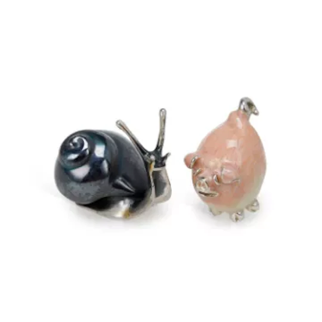 A SILVER AND ENAMEL MODEL OF A SNAIL TOGETHER WITH A SILVER AND ENAMEL