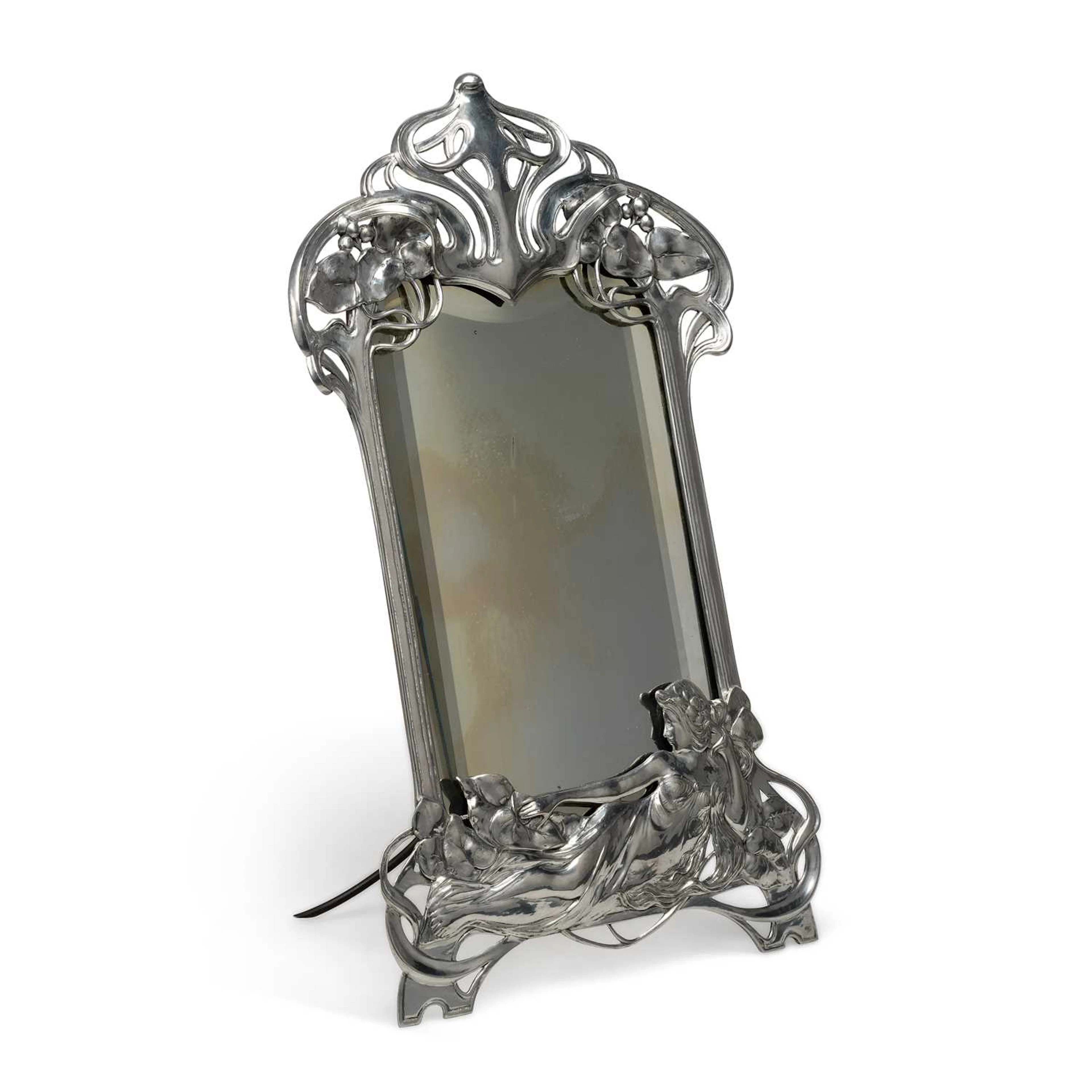 A LARGE ART NOUVEAU SILVER PLATED PEWTER EASEL MIRROR
