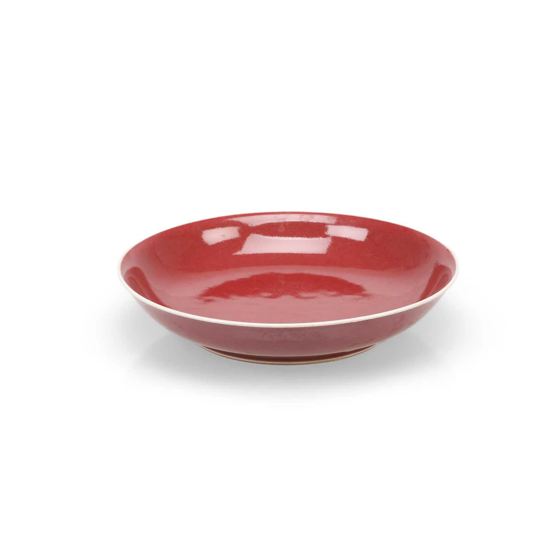 A CHINESE COPPER RED GLAZED DISH