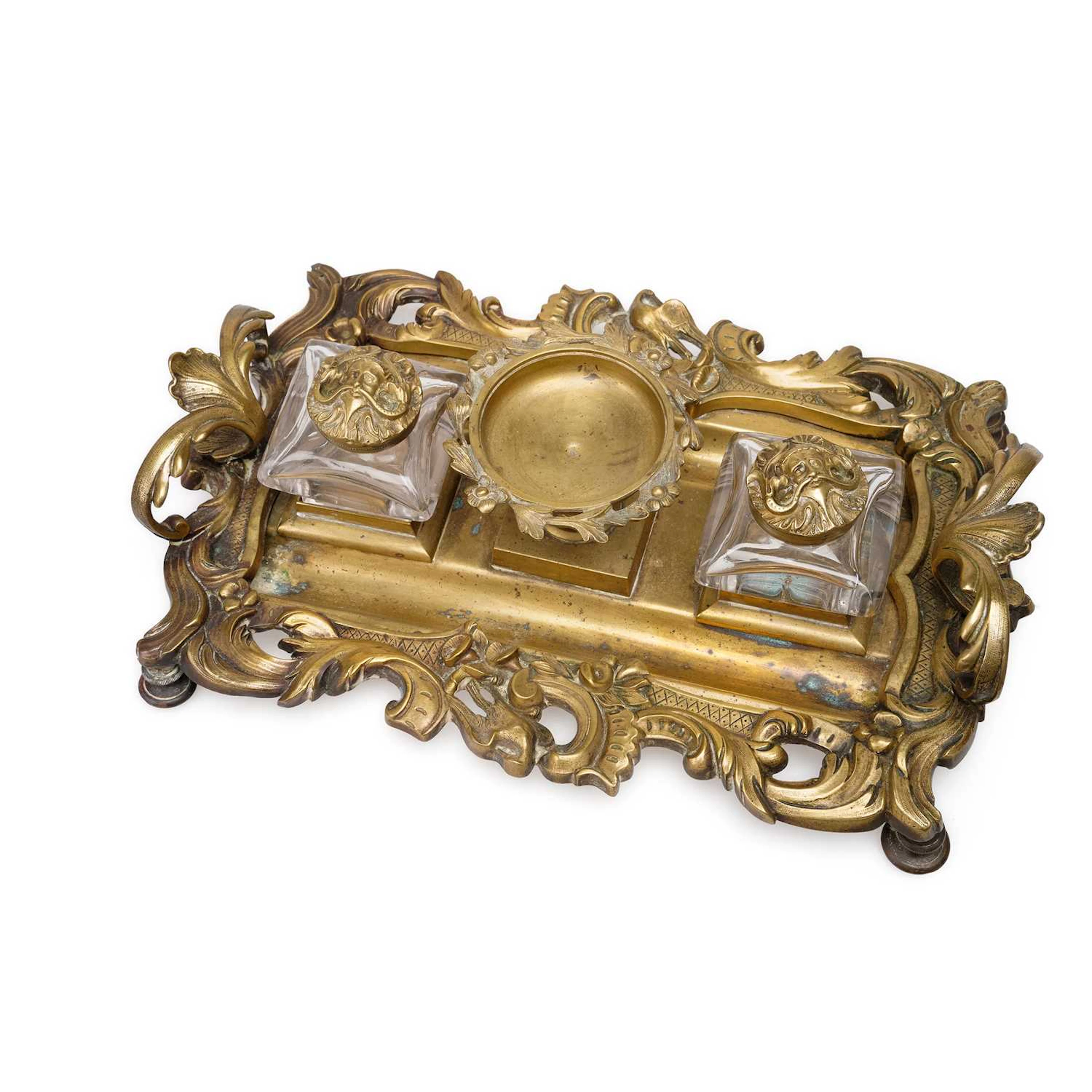 A FRENCH GILT BRASS DESK STAND