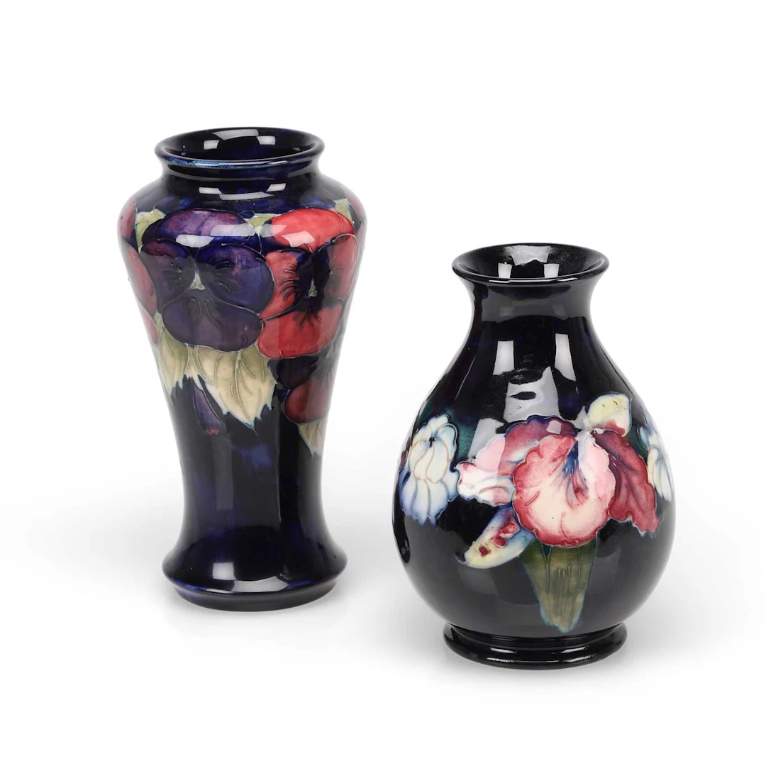 A MOORCROFT 'ORCHID' VASE AND A 'PANSY' VASE