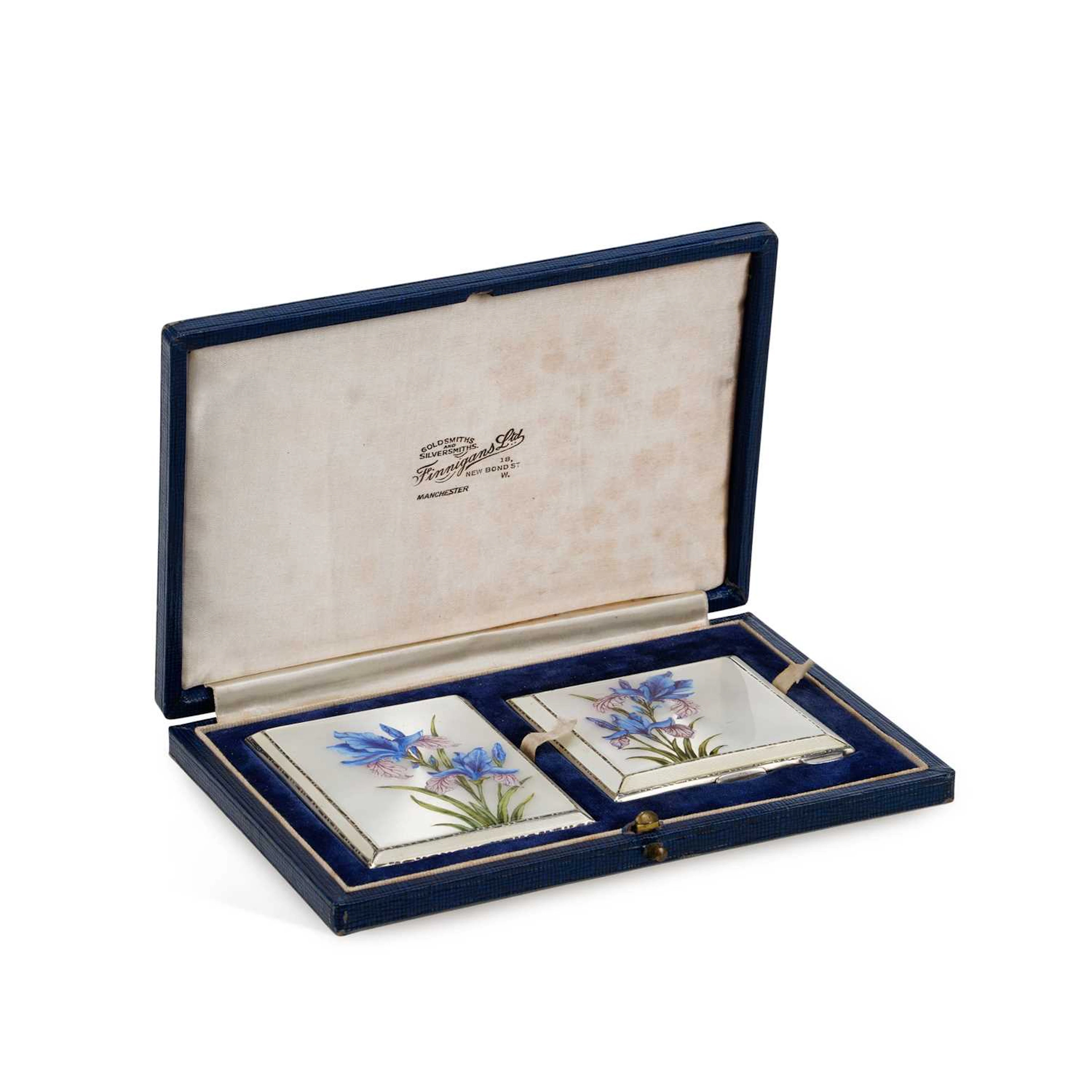 A GEORGE VI SILVER AND ENAMEL CIGARETTE CASE AND COMPACT SET