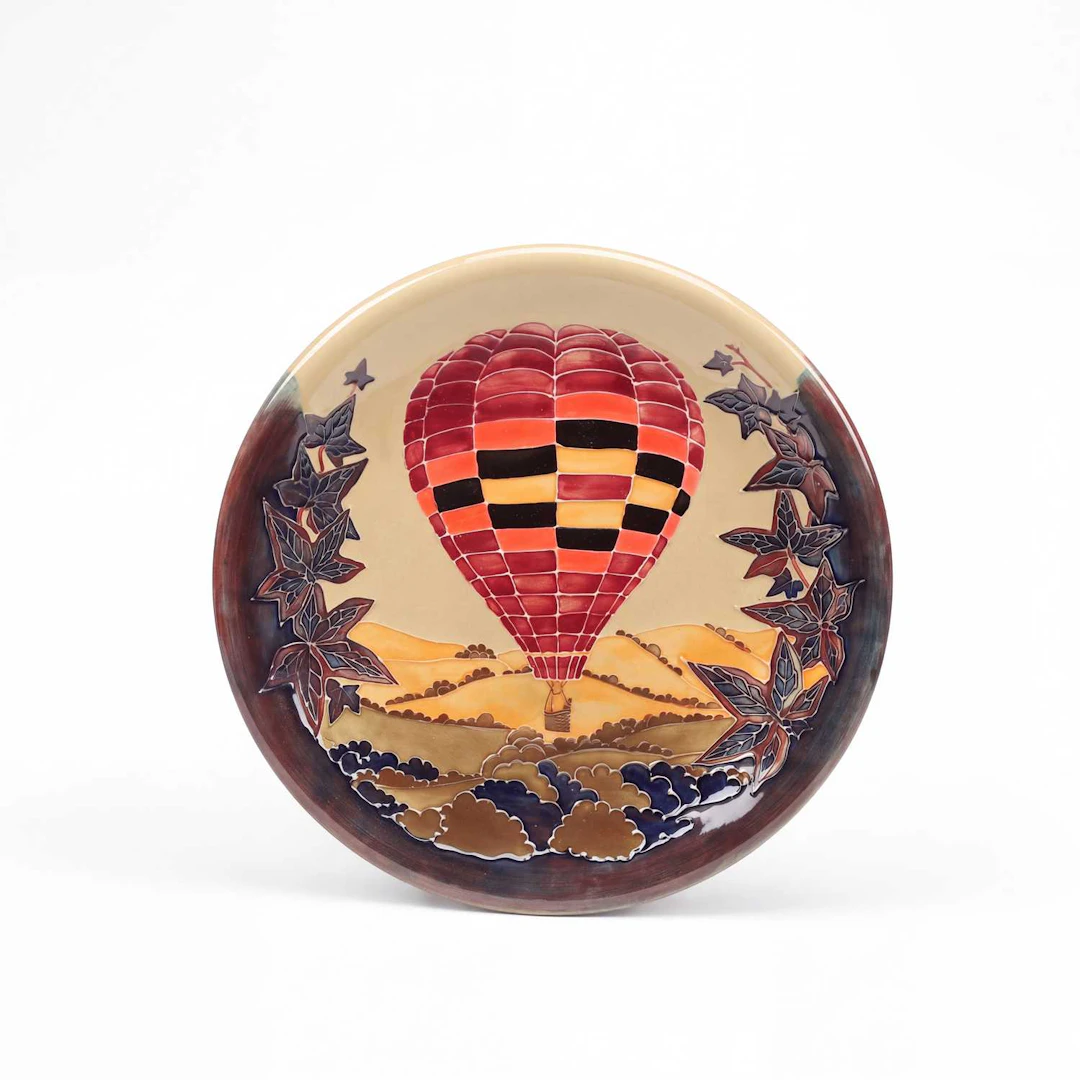 A LIMITED EDITION 'HOT AIR BALLOON' PATTERN CHARGER SALLY TUFFIN FOR MOORCROFT