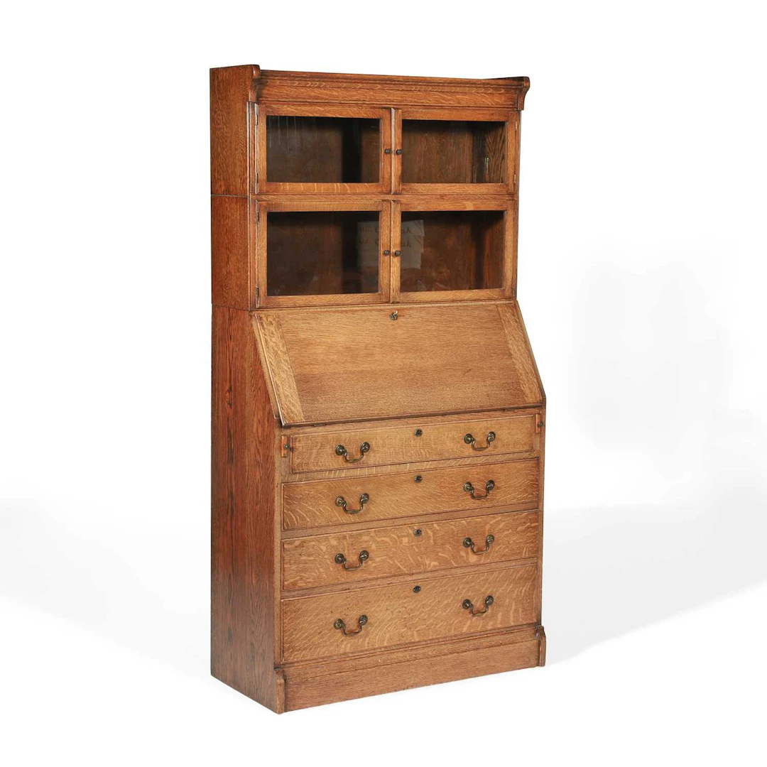 AN OAK BUREAU BOOKCASE