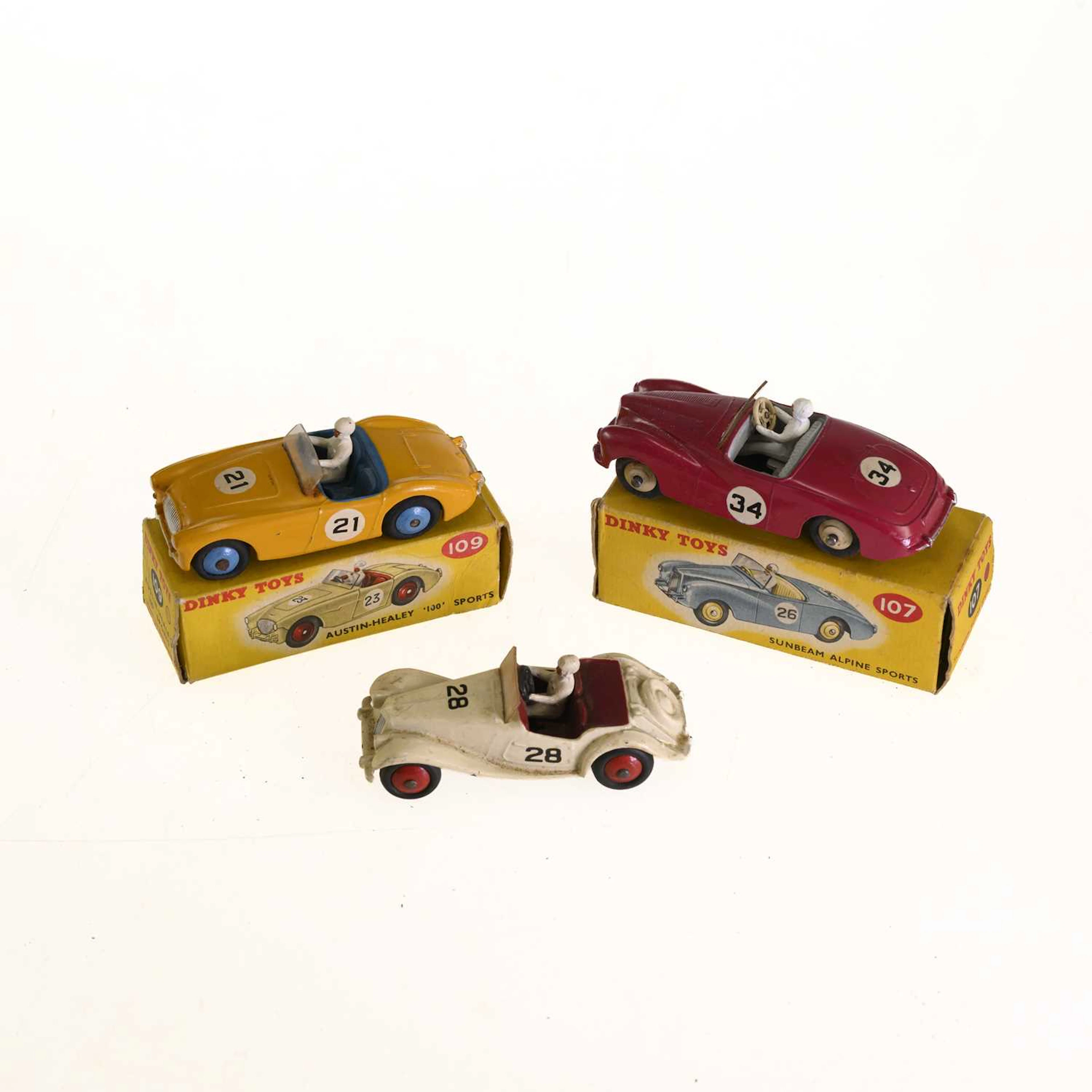 THREE DINKY DIECAST MODEL RACING CARS